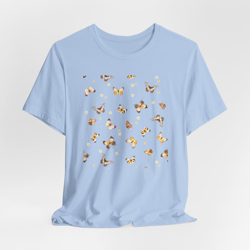 Light blue t-shirt with butterfly pattern on a light gray background