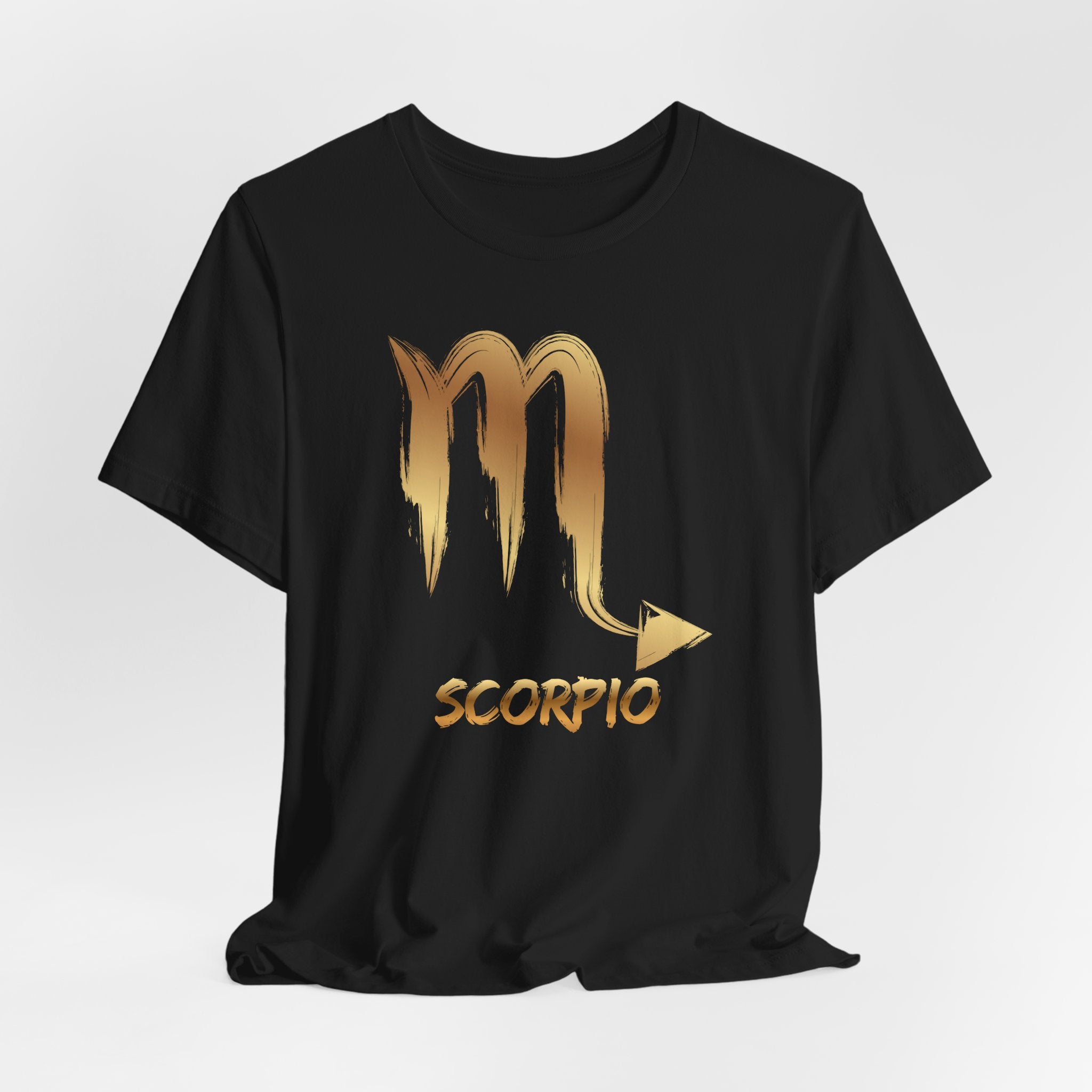 Black t-shirt with gold Scorpio zodiac symbol on a white background