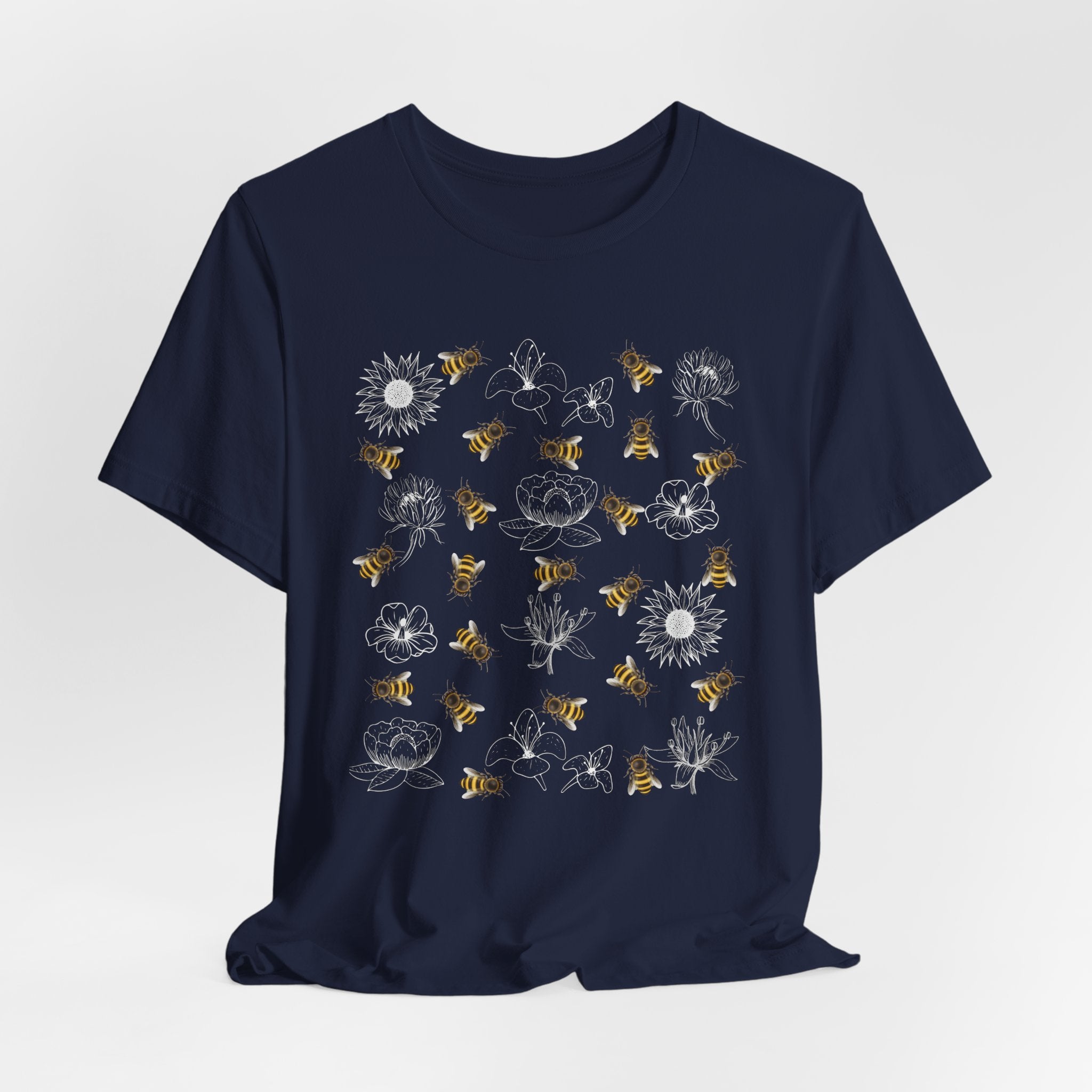 Navy blue t-shirt with white graphic design on a light gray background