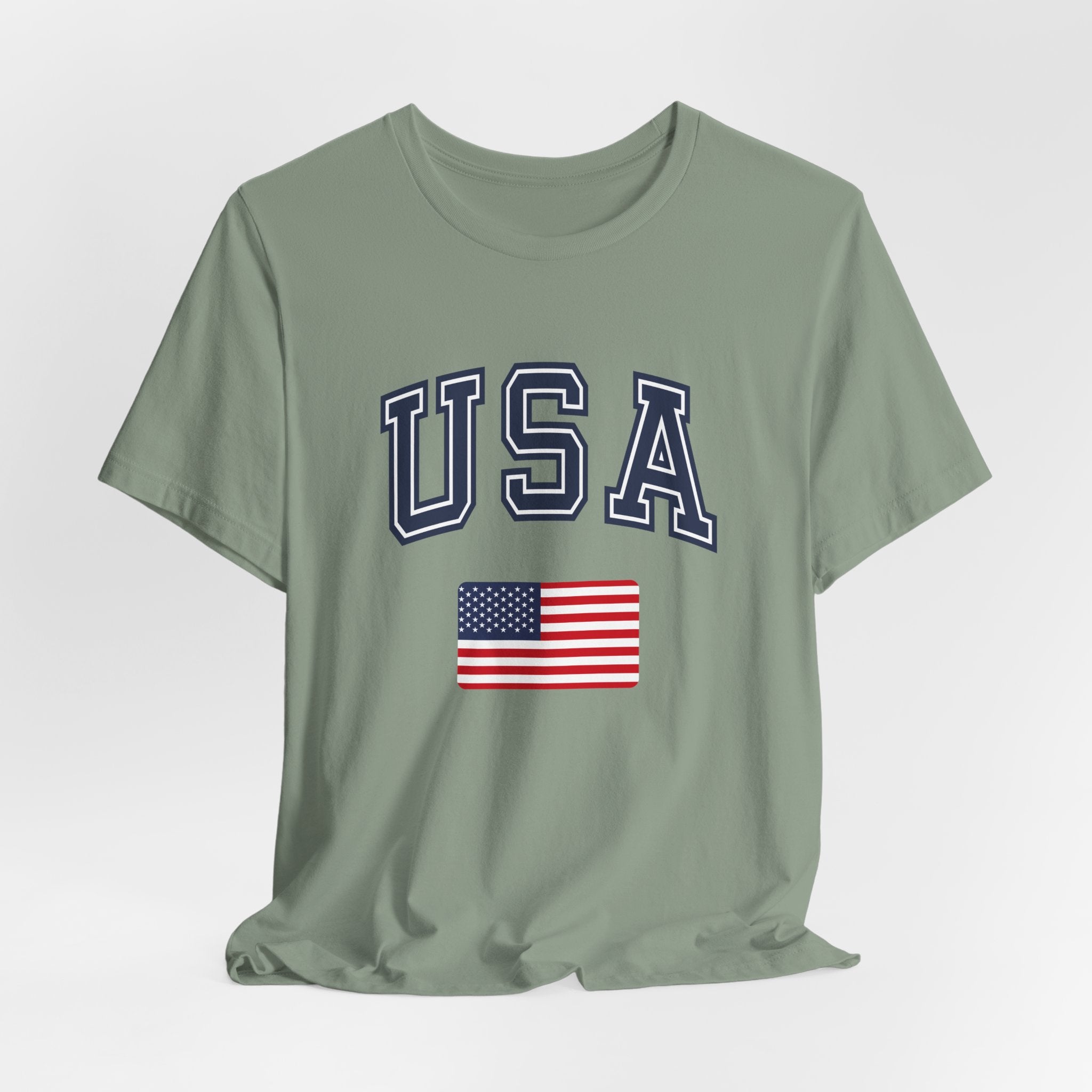 Green t-shirt with 'USA' text and American flag on a light gray background