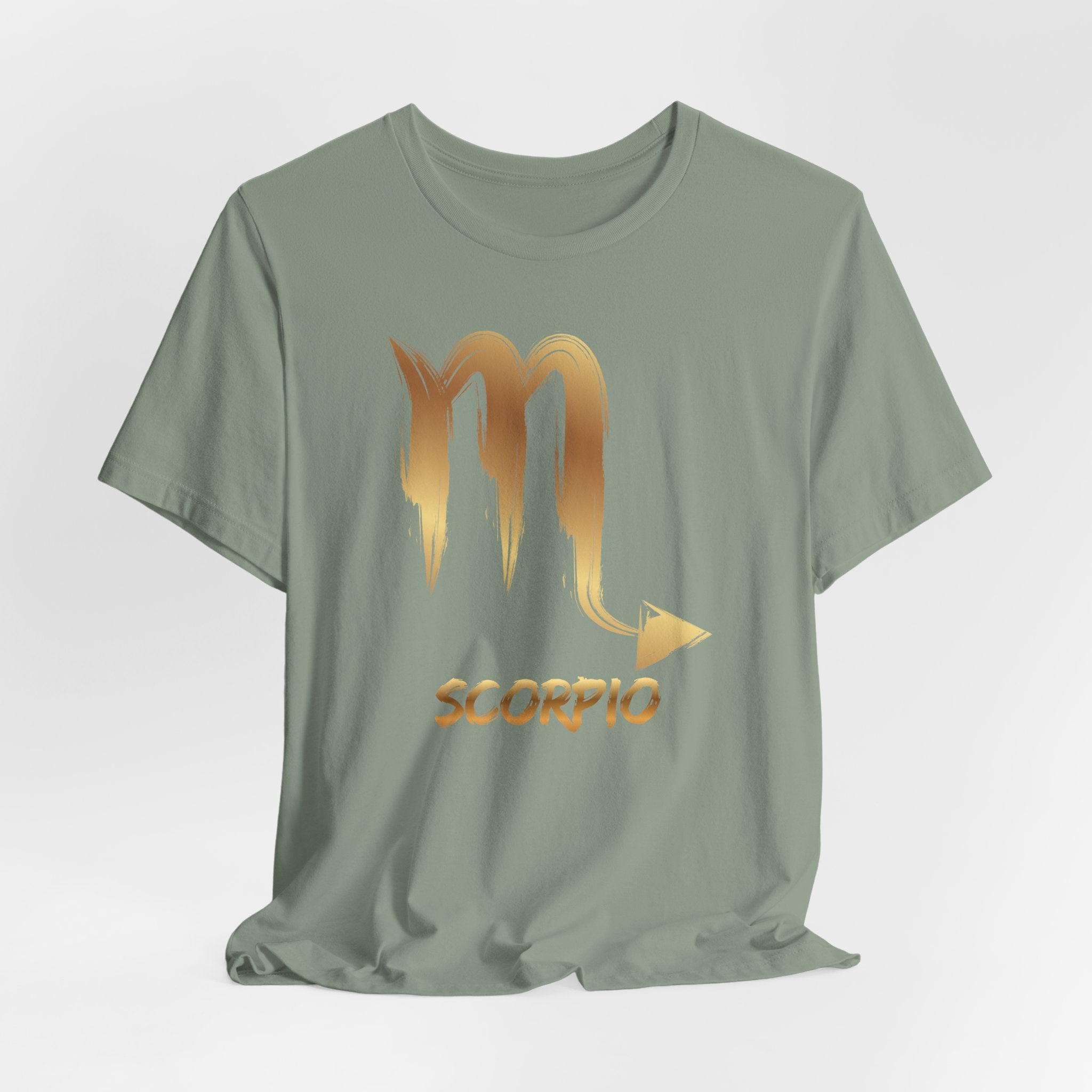 Green t-shirt with Scorpio zodiac sign design on a light gray background