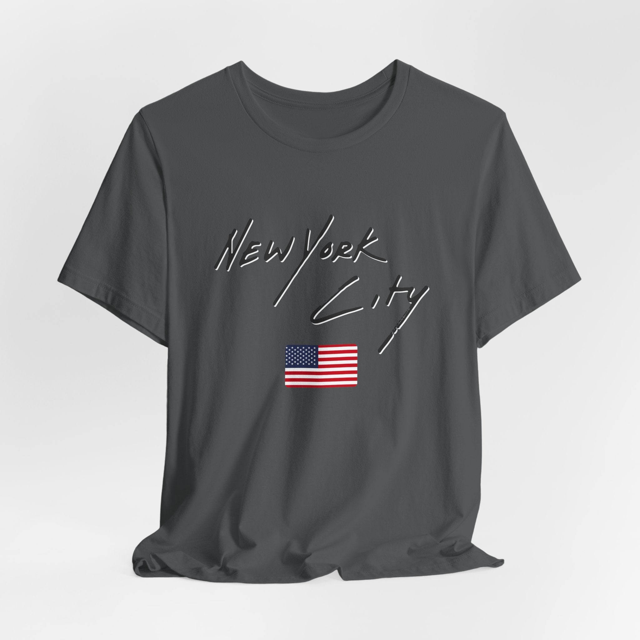 Dark grey t-shirt with 'New York City' text and American flag on a white background