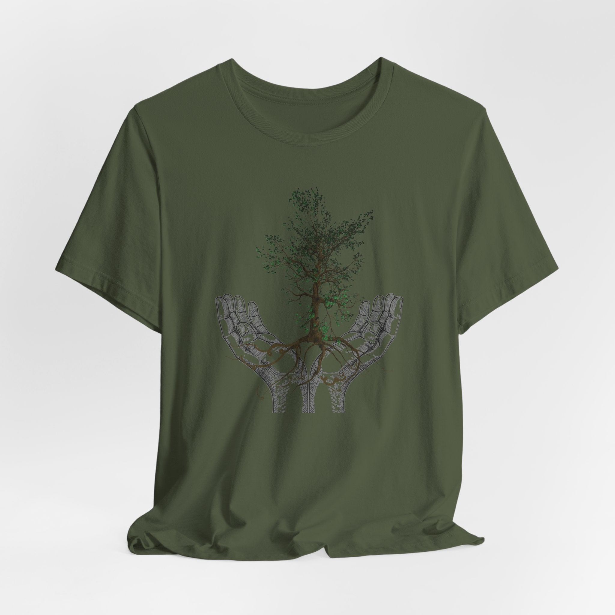 Green t-shirt with a tree and wolf design on a white background
