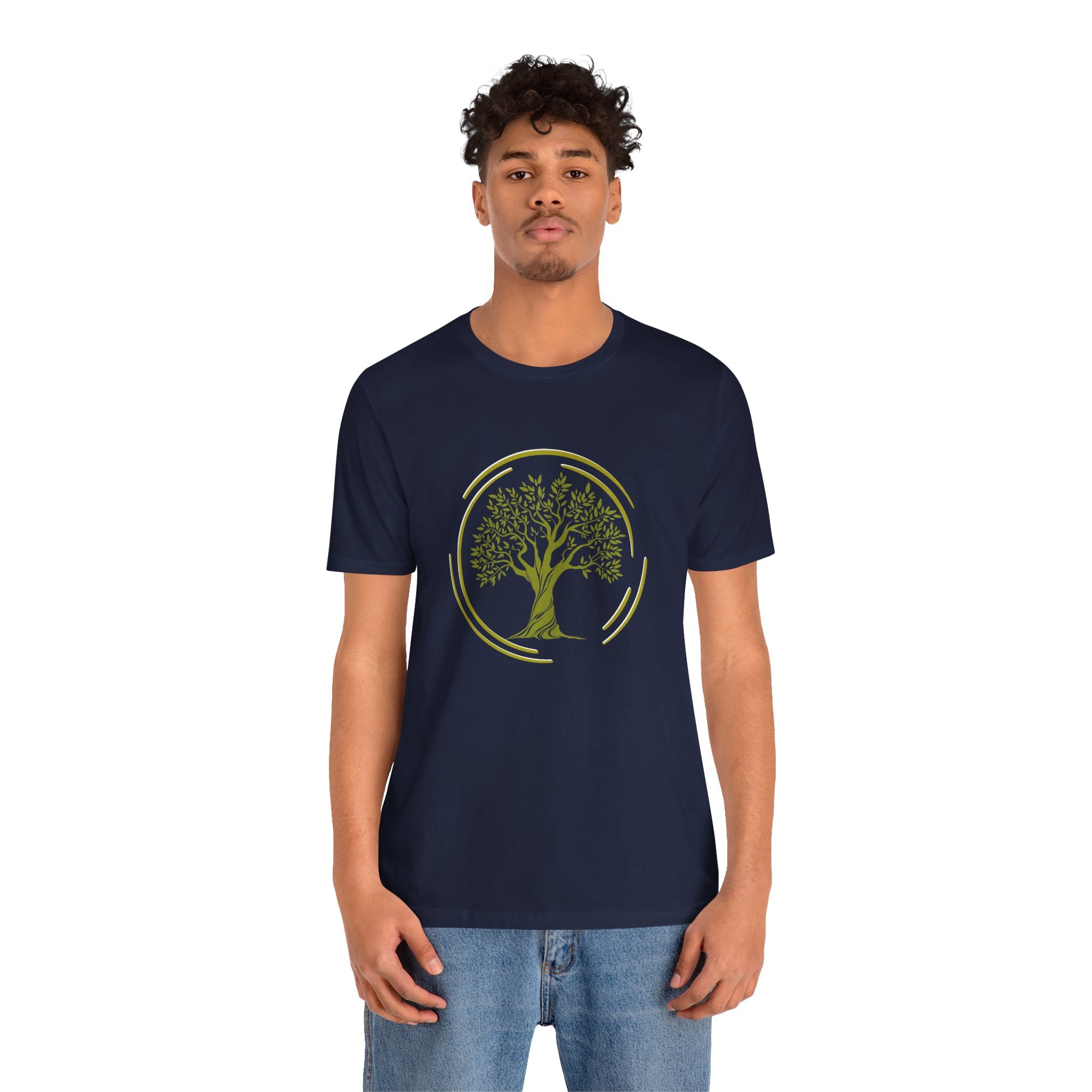 Man wearing a navy blue t-shirt with a tree design on a white background
