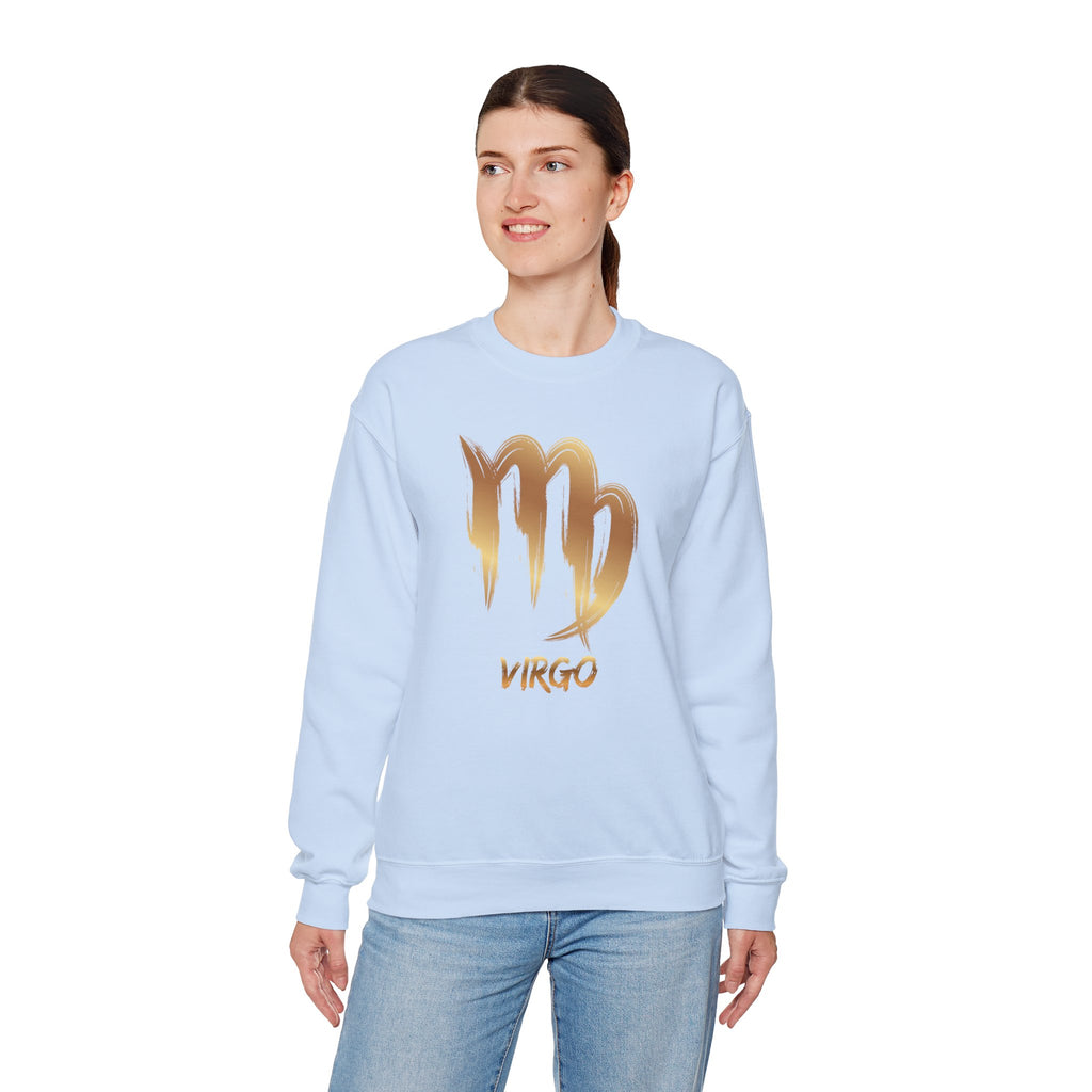Woman wearing a light blue sweatshirt with 'Virgo' and a gold zodiac sign on a white background