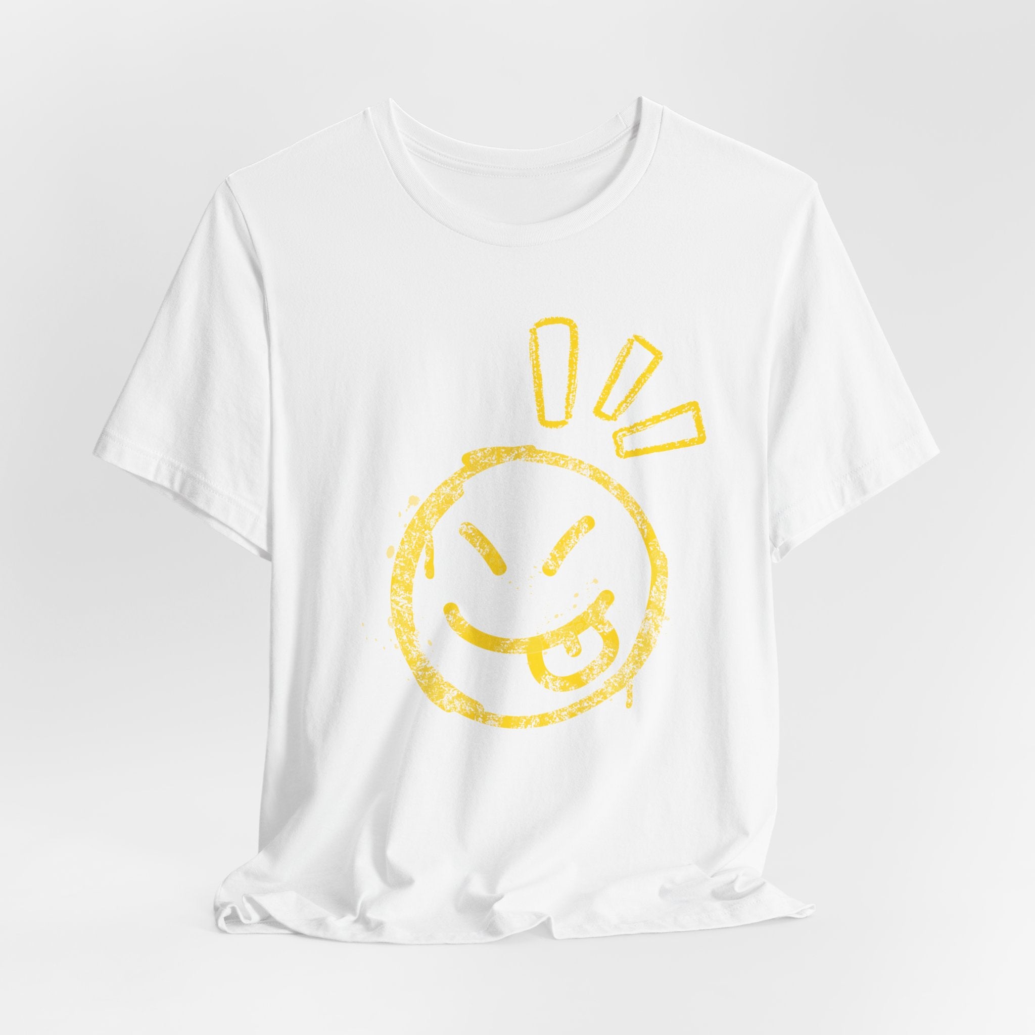 White t-shirt with a yellow smiley face design on a light gray background