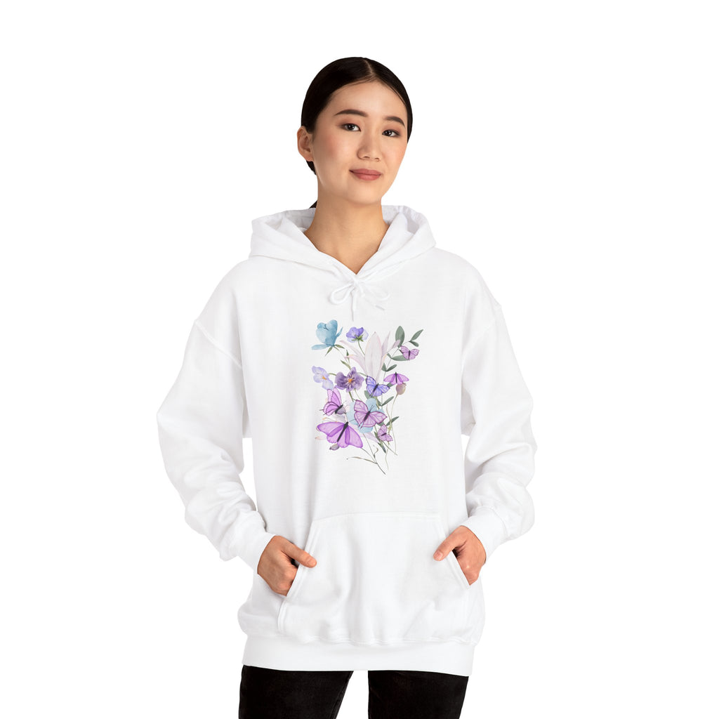 Person wearing a white hoodie with floral design on a white background