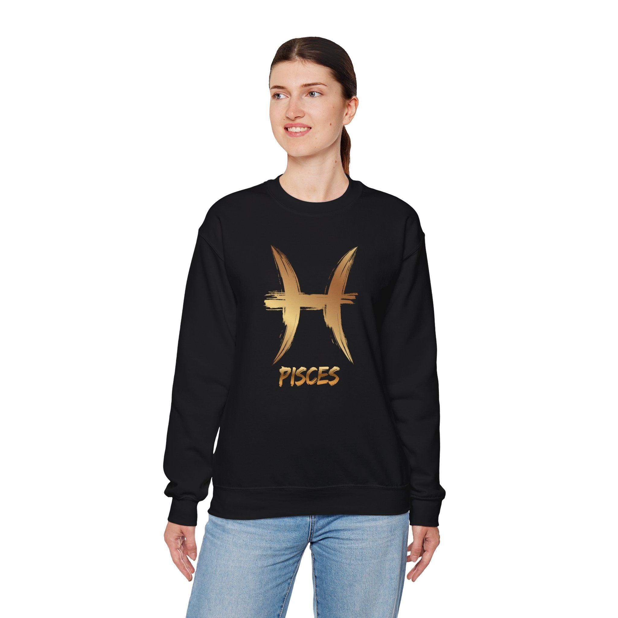 Person wearing a black sweatshirt with gold Pisces symbol and text on a white background