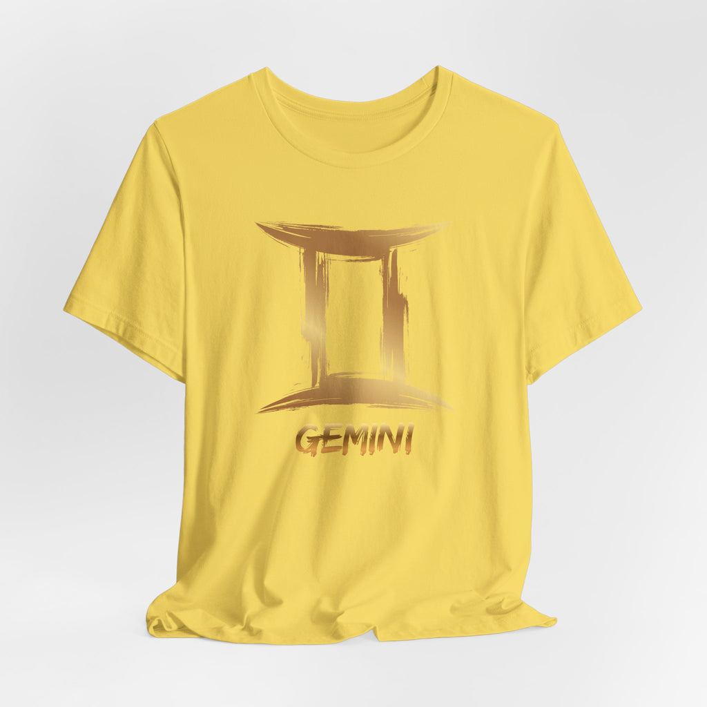 Yellow t-shirt with Gemini zodiac sign design on a light gray background