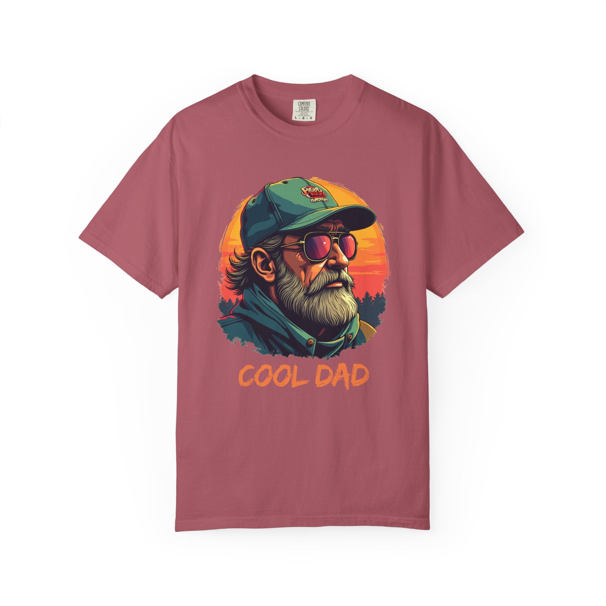 Maroon t-shirt with 'Cool Dad' graphic design featuring a man with sunglasses and a cap on a white background