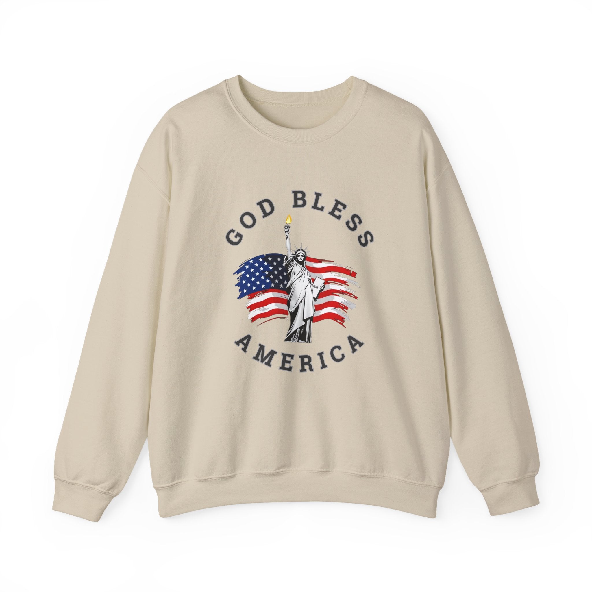 Beige sweatshirt with 'God Bless America' graphic featuring the Statue of Liberty and American flag on a white background.