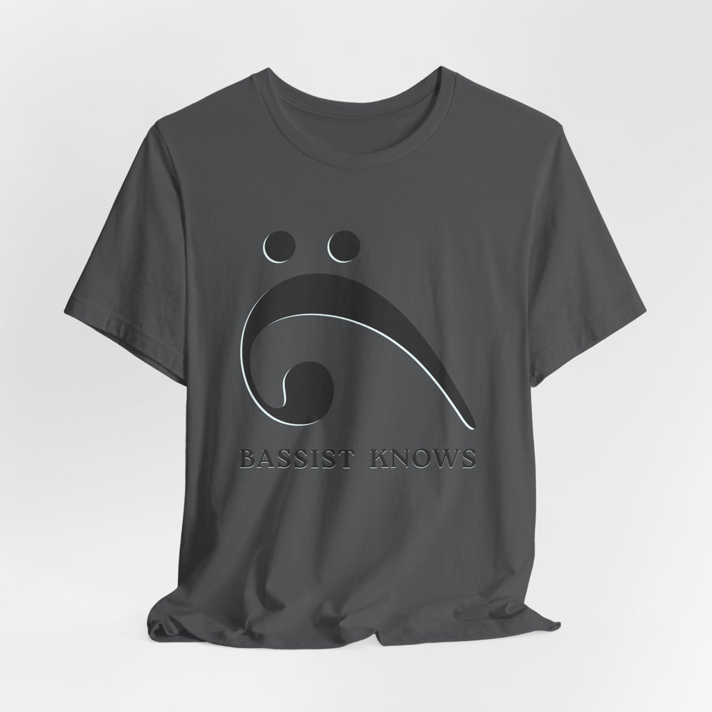 Dark grey t-shirt with black bass clef and 'Bassist Knows' text on a light gray background