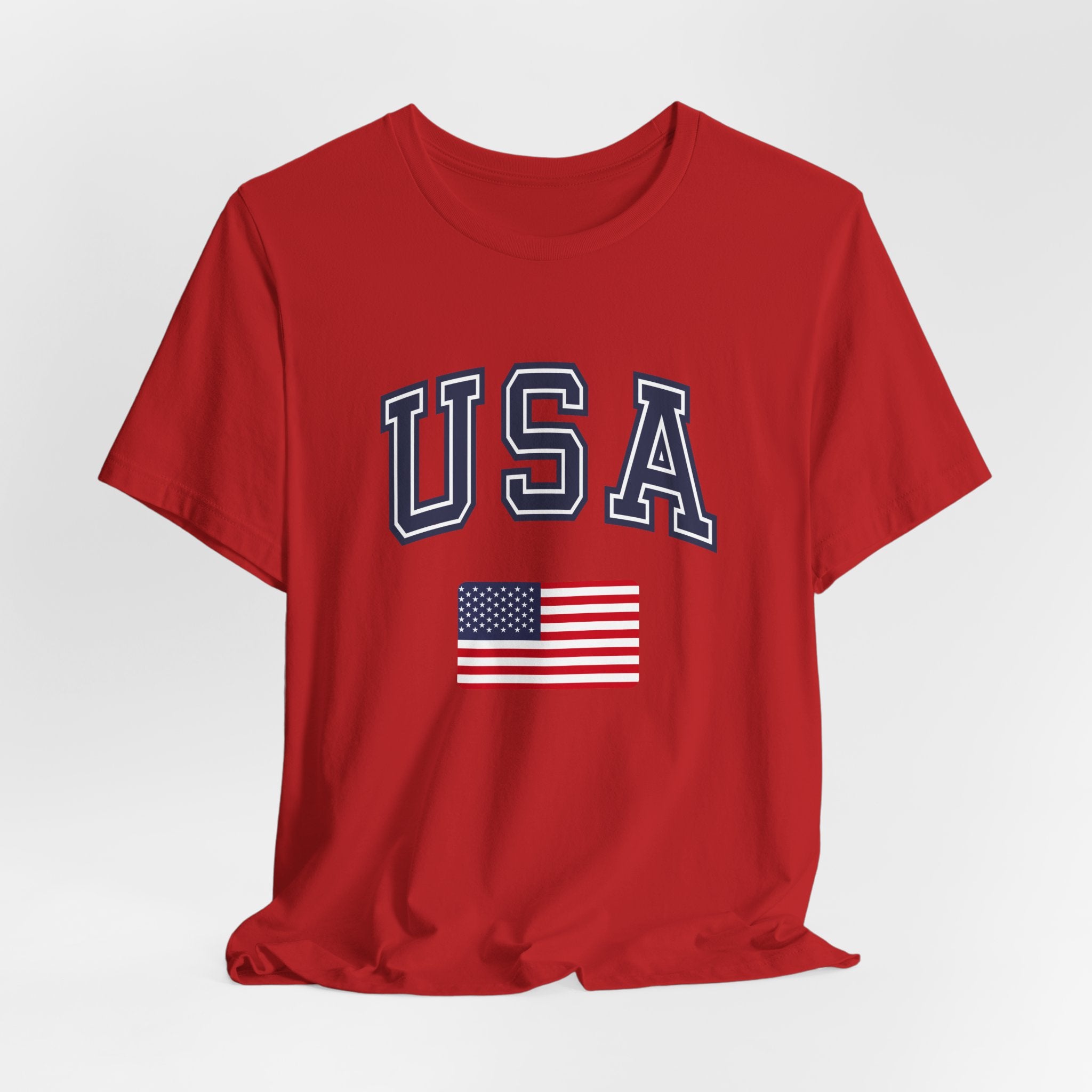 Red t-shirt with 'USA' and American flag on a white background