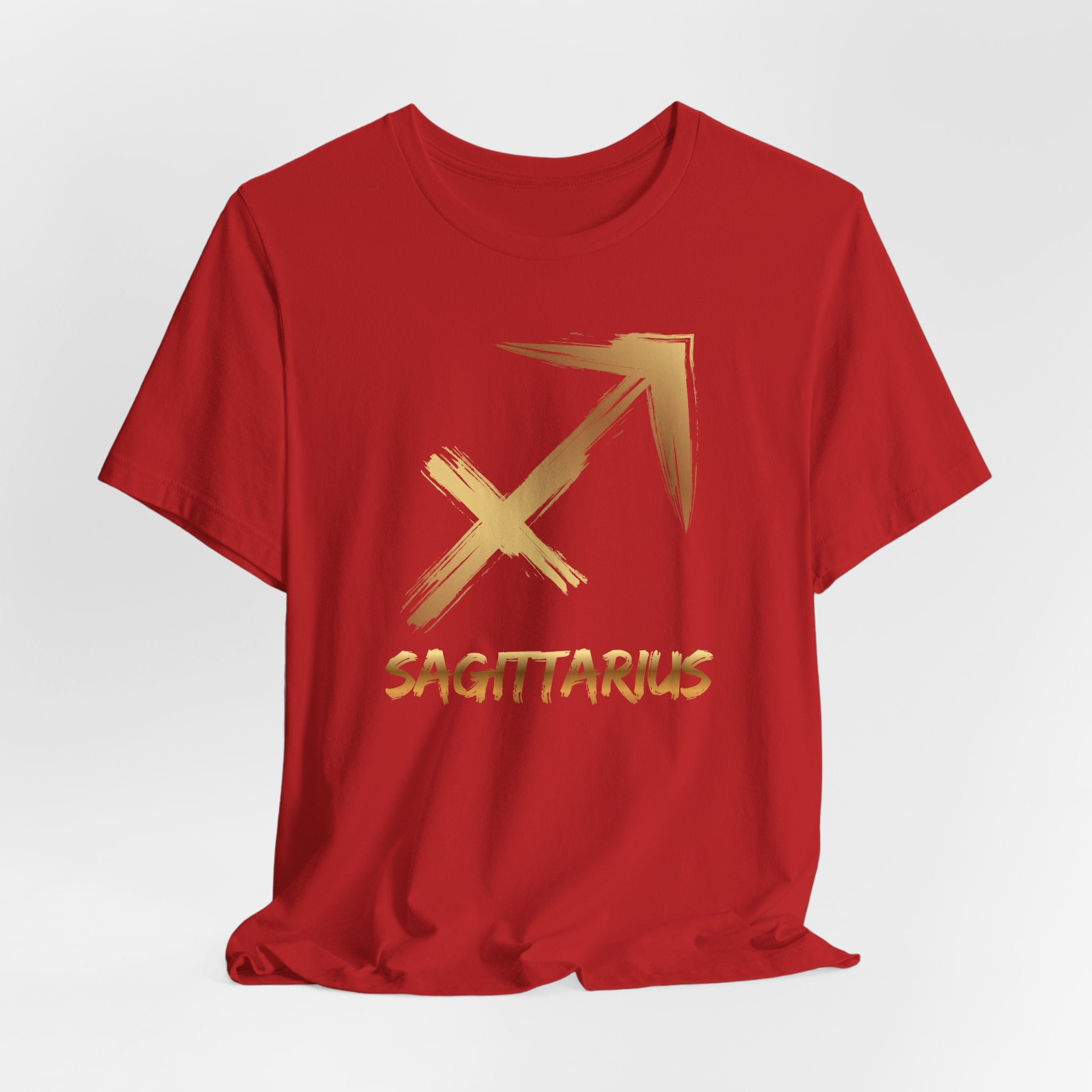 Red t-shirt with gold Sagittarius symbol on a white background