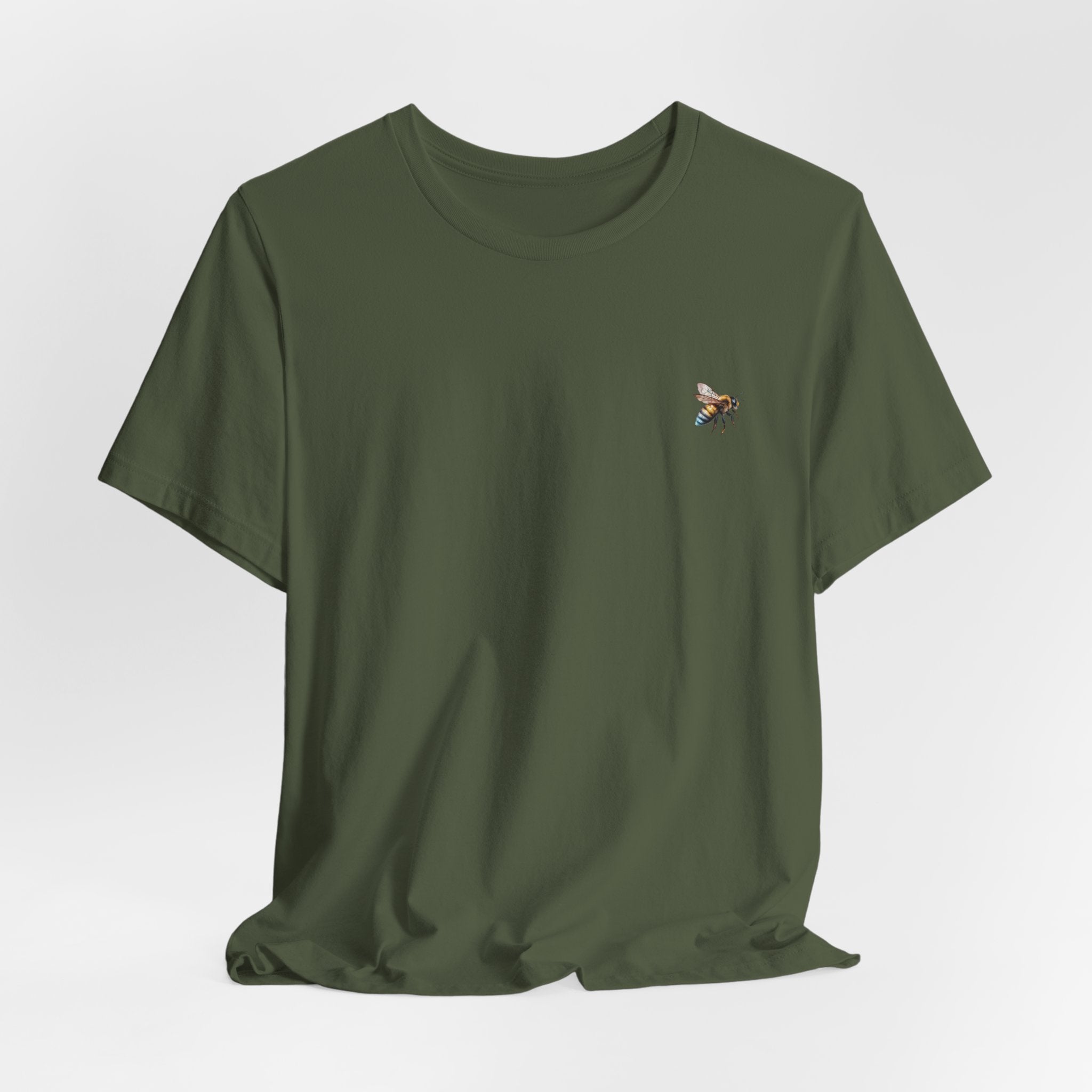 Green t-shirt with a bee design on a light gray background