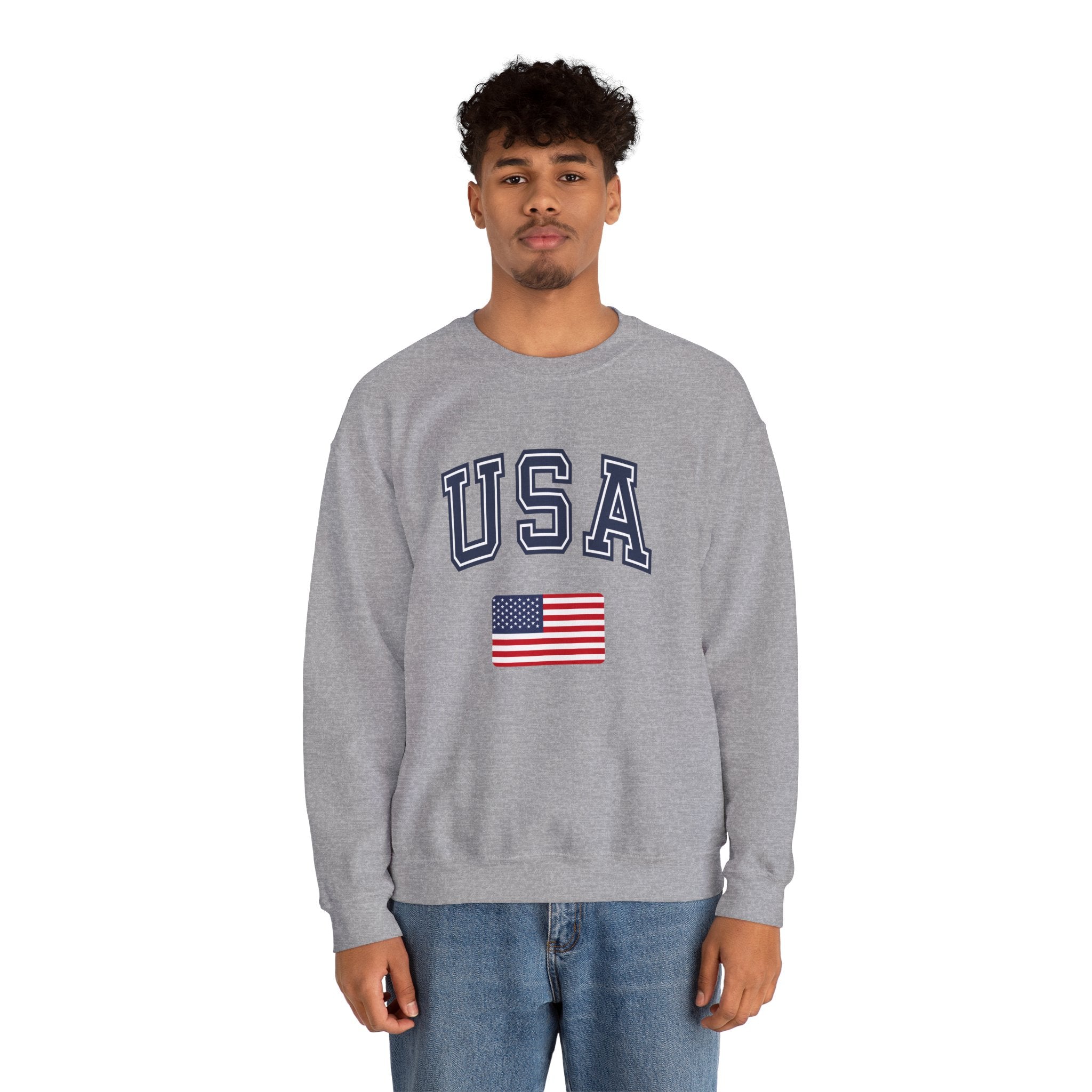 Person wearing a gray sweatshirt with 'USA' and an American flag on a white background