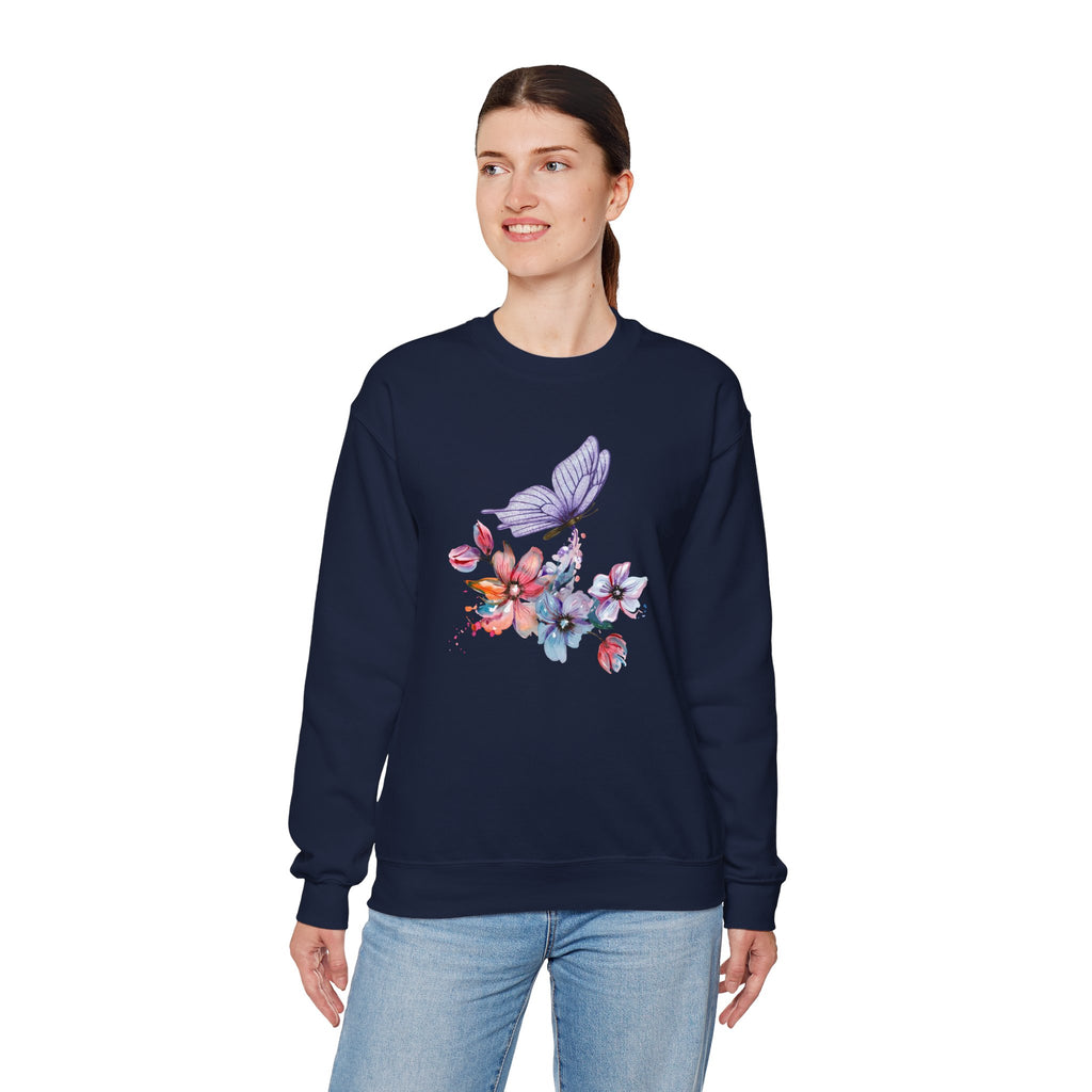 Woman wearing a navy sweatshirt with floral and butterfly design on a white background
