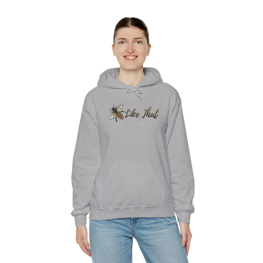 Woman wearing gray hoodie with a bee and text "Like  That" design on a white background