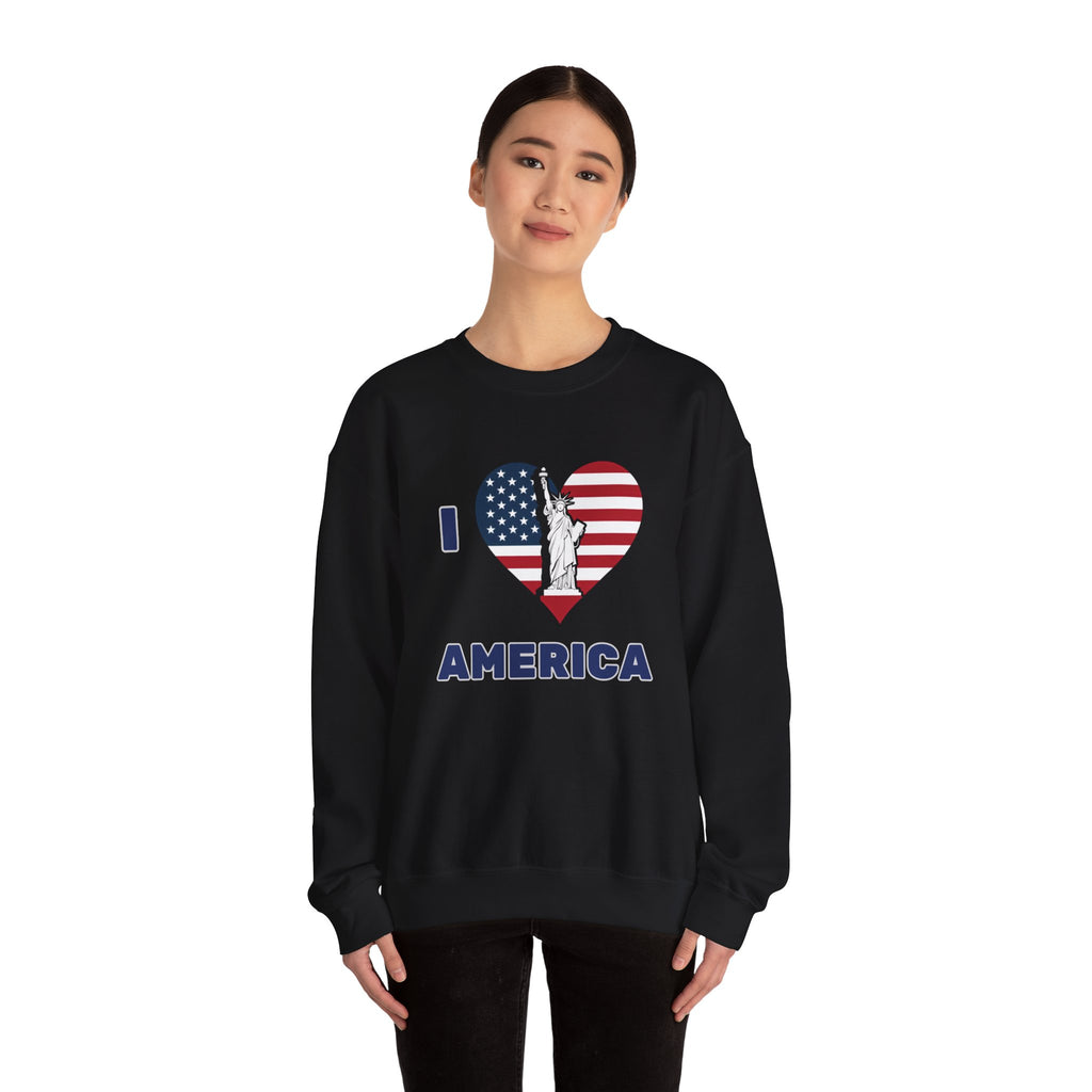 Person wearing a black sweatshirt with 'I Love America' design featuring the Statue of Liberty.
