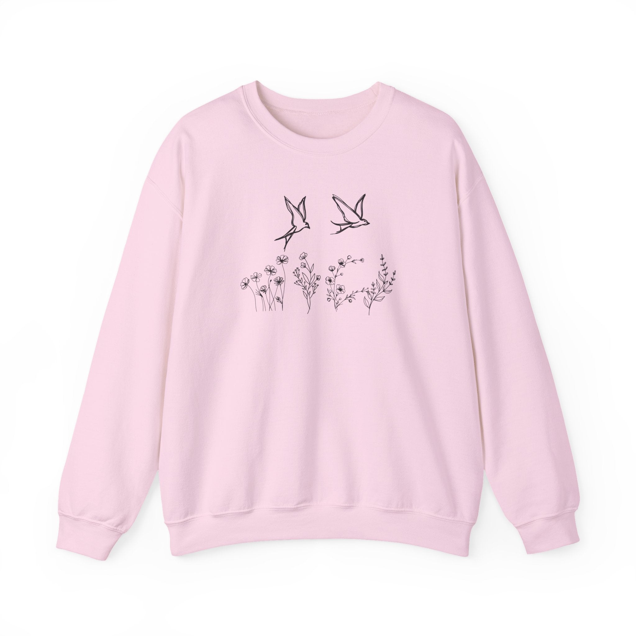 Pink sweatshirt with bird and floral design on a white background