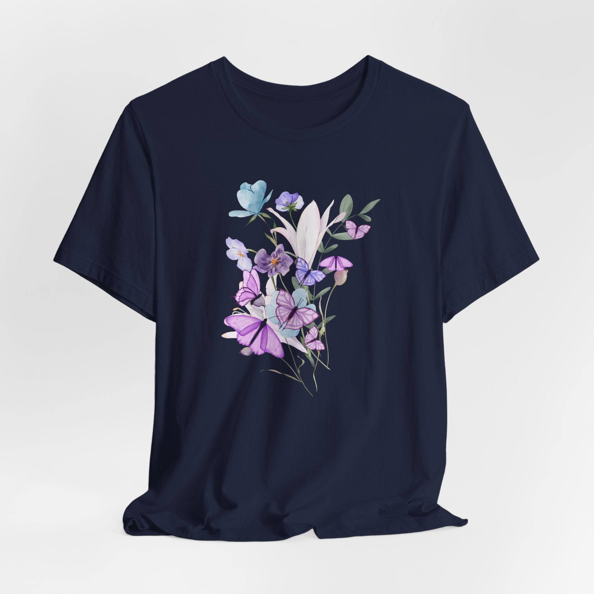 Navy blue t-shirt with floral design on a light gray background