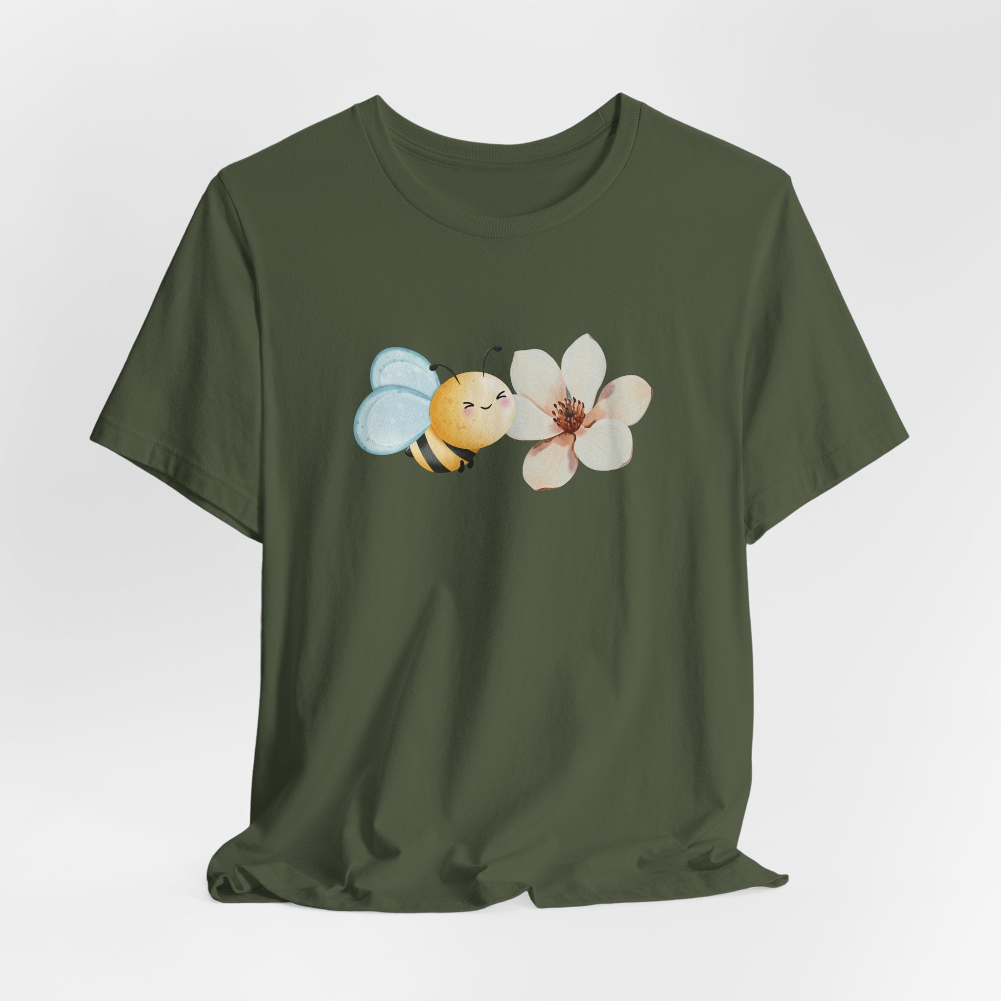Green t-shirt with a bee and flower design on a white background