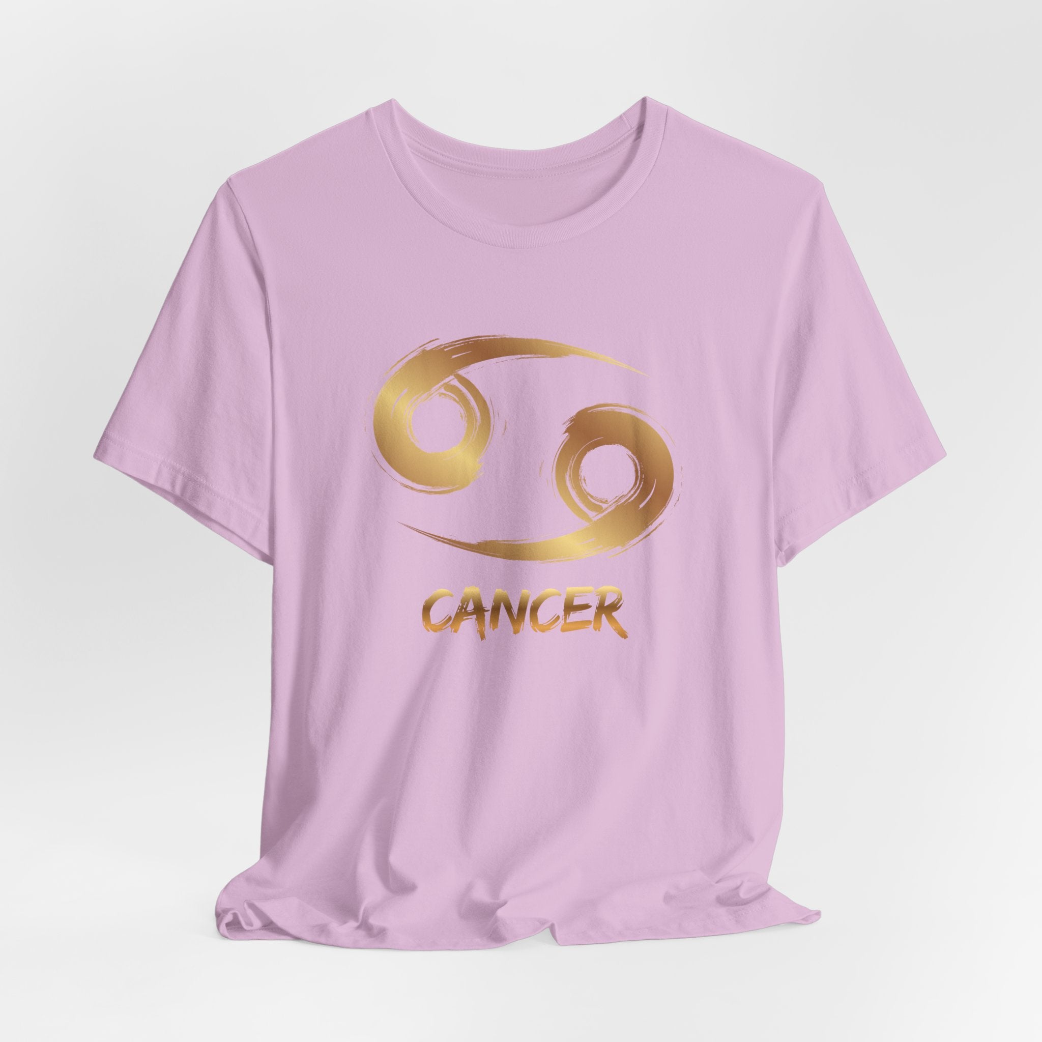 Pink t-shirt with gold Cancer zodiac symbol on a white background