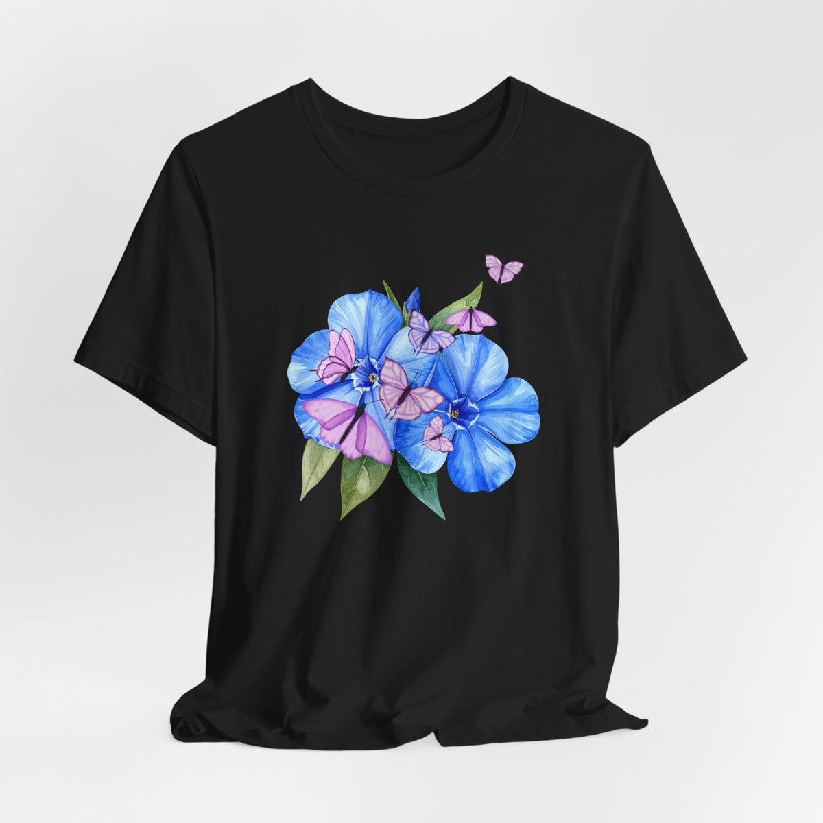 Black t-shirt with blue floral design on a white background