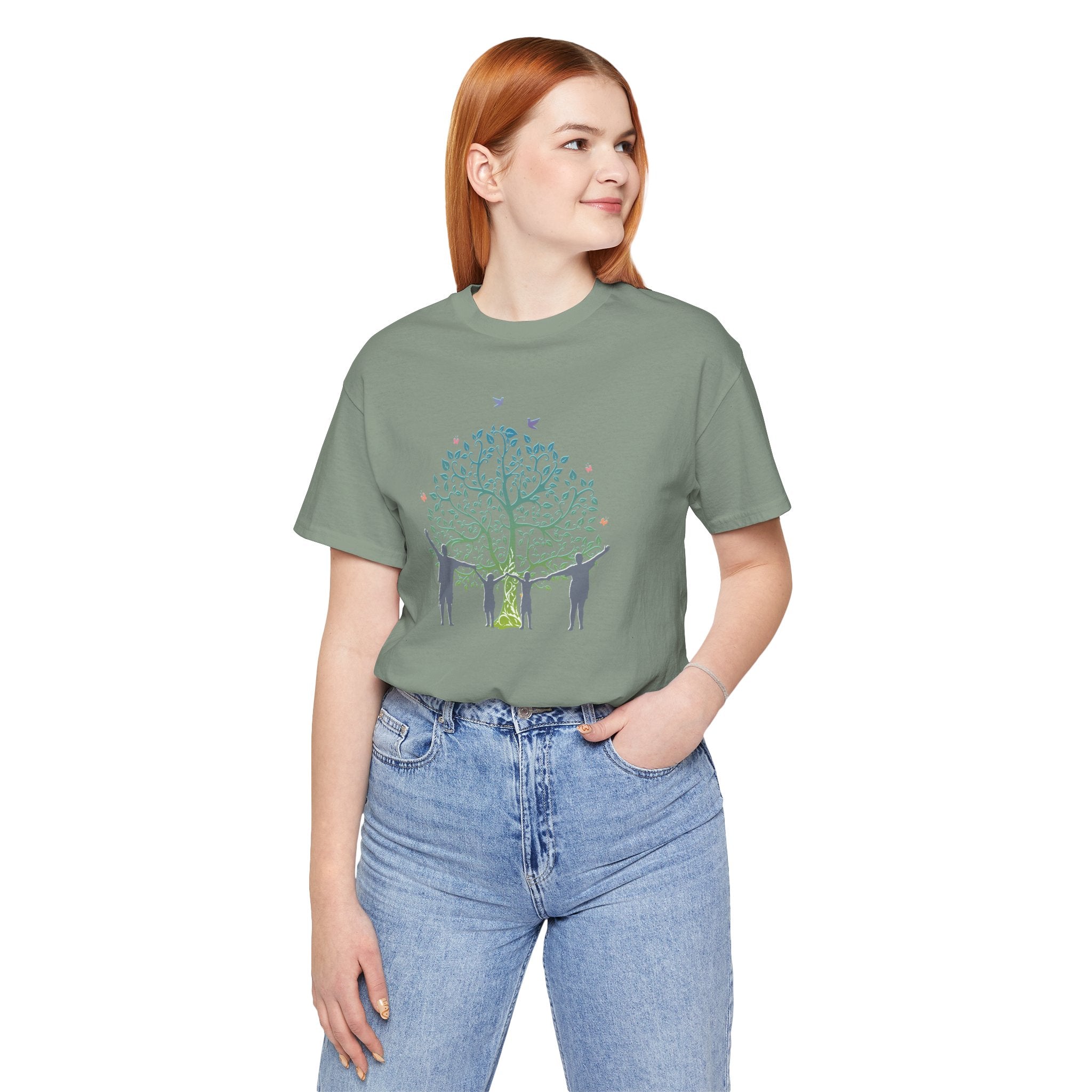 Person wearing a green t-shirt with a graphic design on a white background