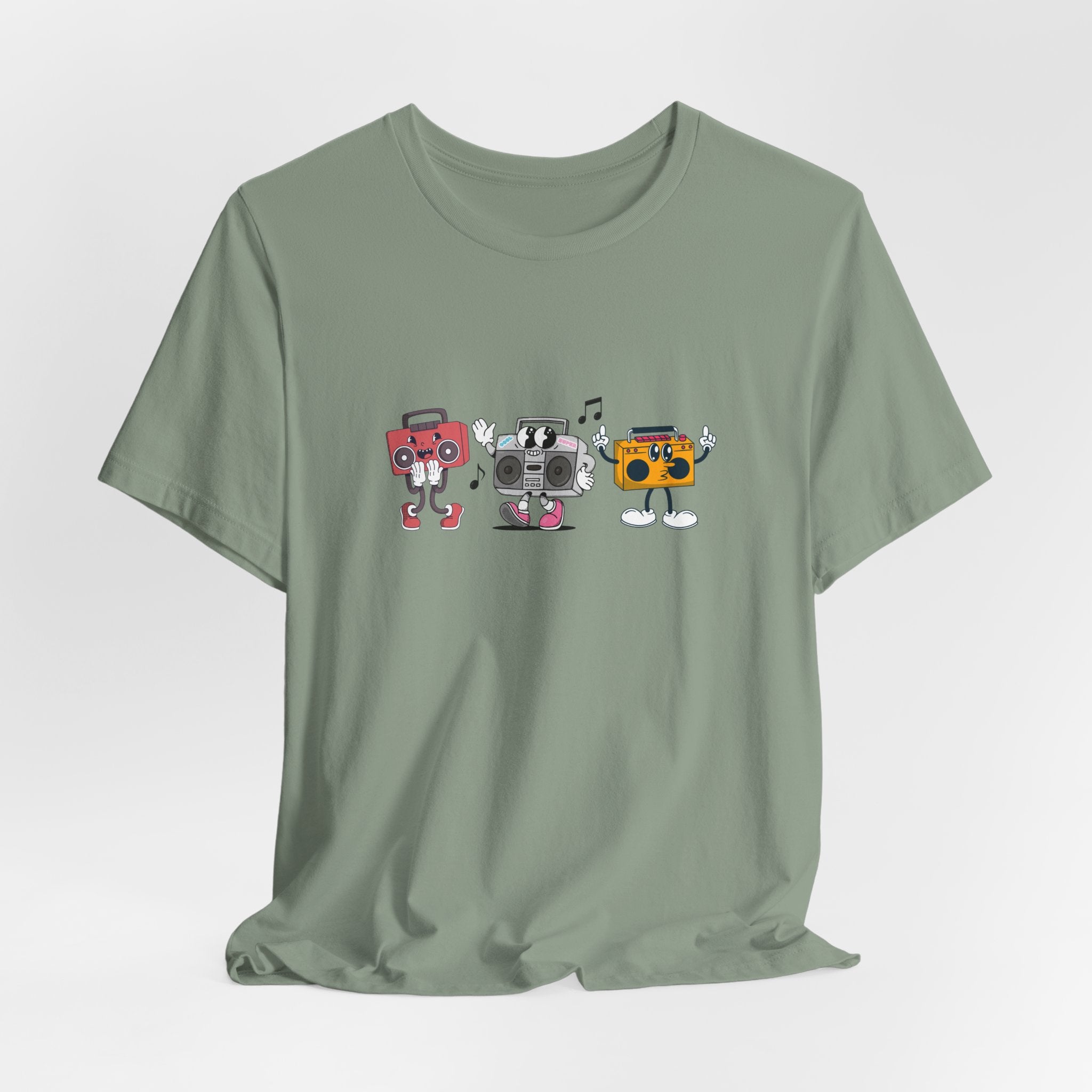 Green t-shirt with cartoon boomboxes on a light gray background