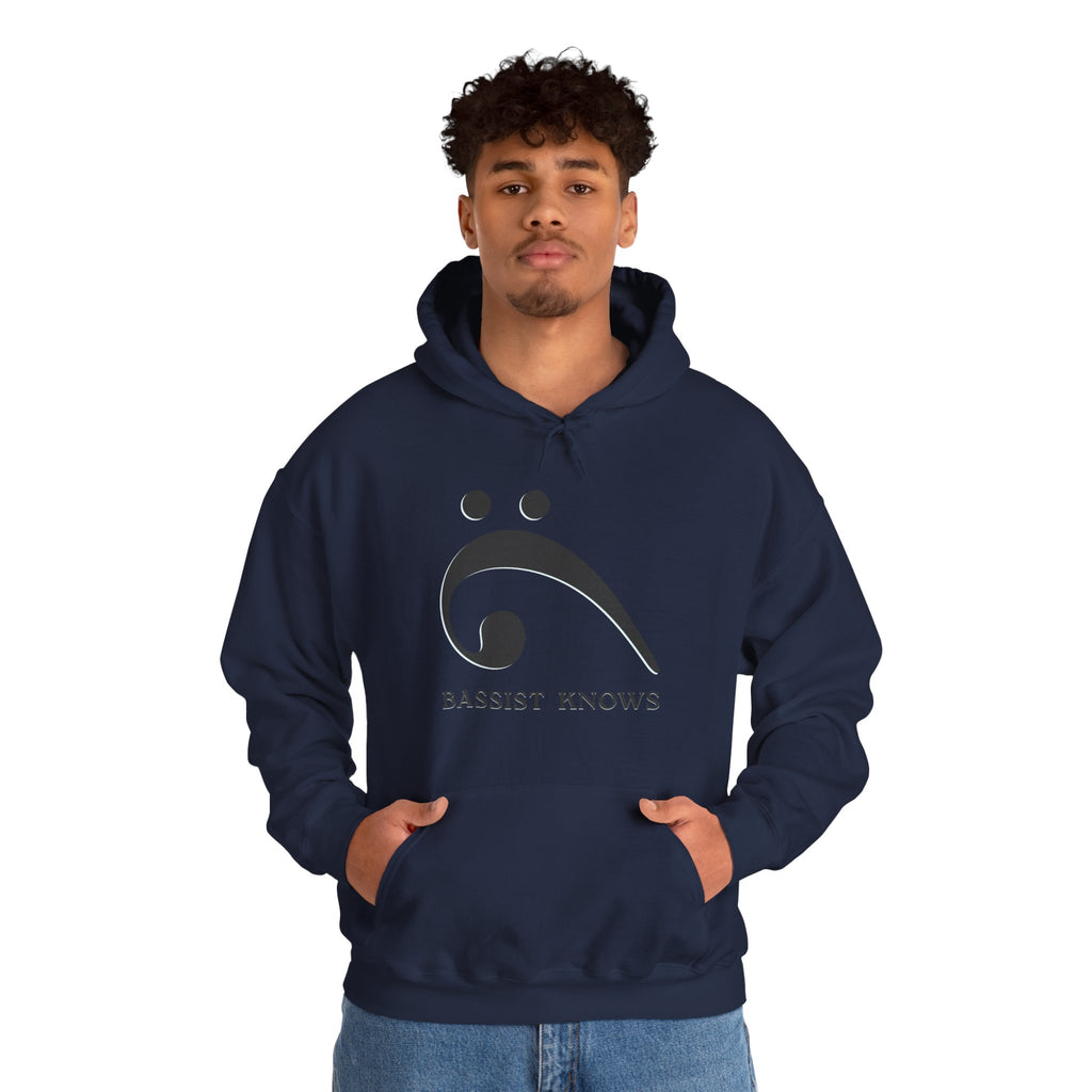 Man wearing a navy hoodie with a black bass clef graphic and "Bassist Knows" text on a white background