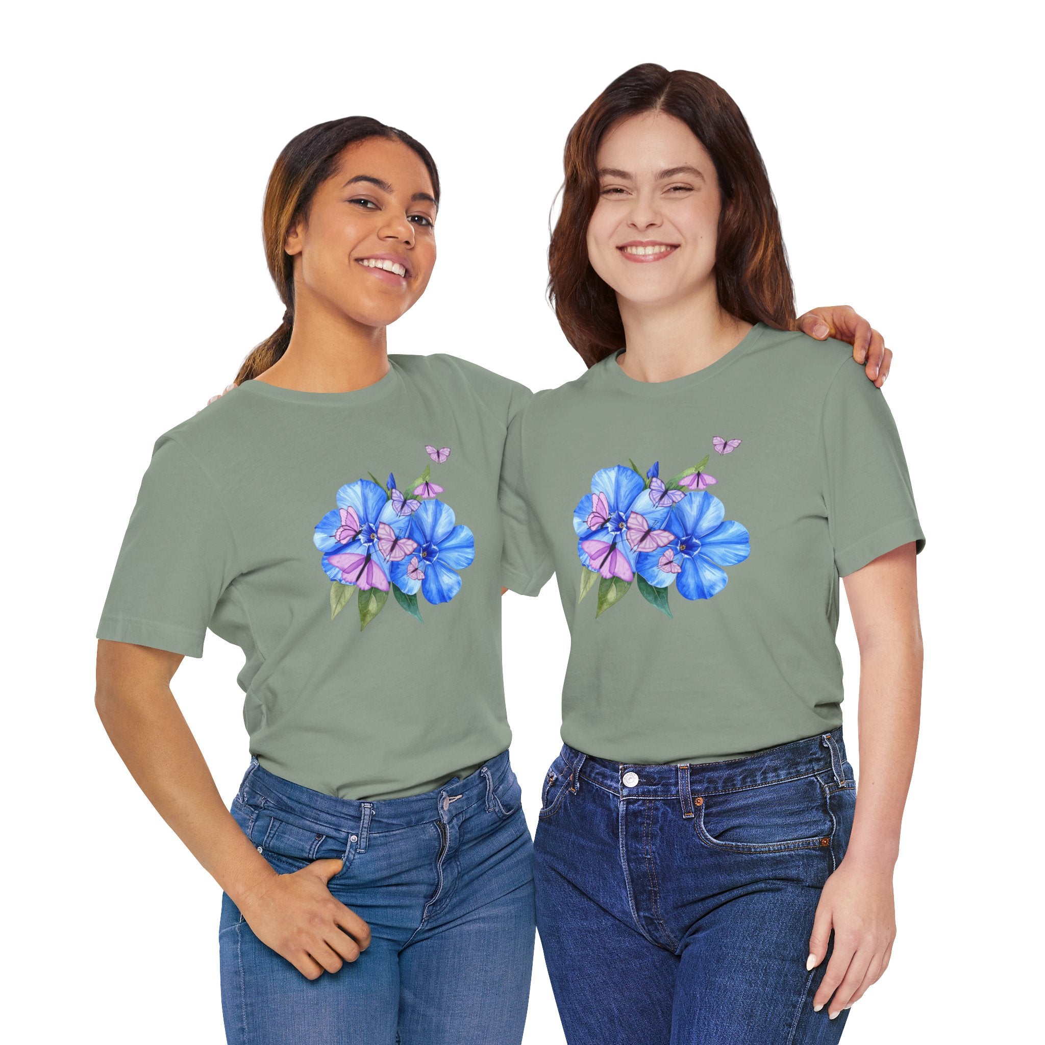 Two people wearing matching green t-shirts with a floral design on a white background