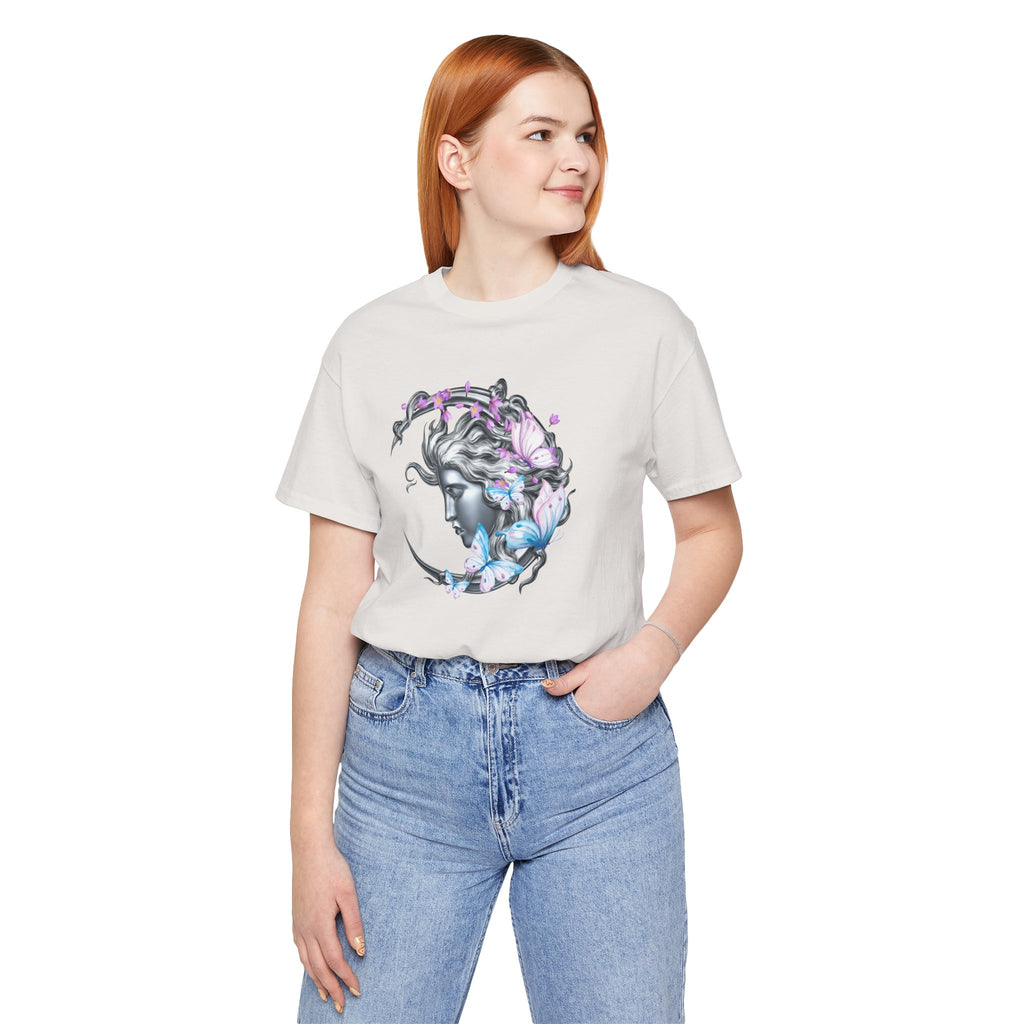 Person wearing a light gray t-shirt with a colorful tiger design on a white background