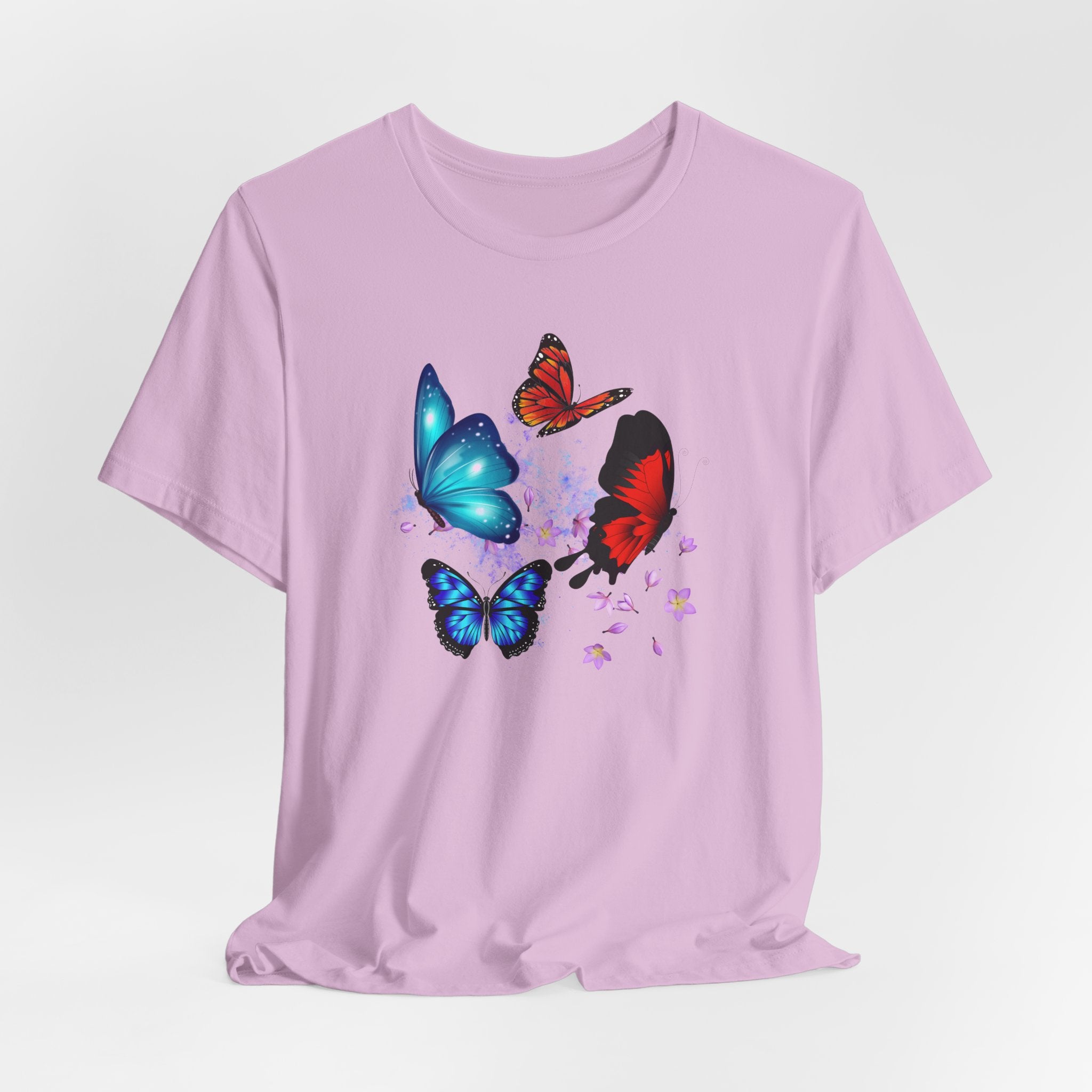 Light purple t-shirt with colorful butterfly designs on a light gray background