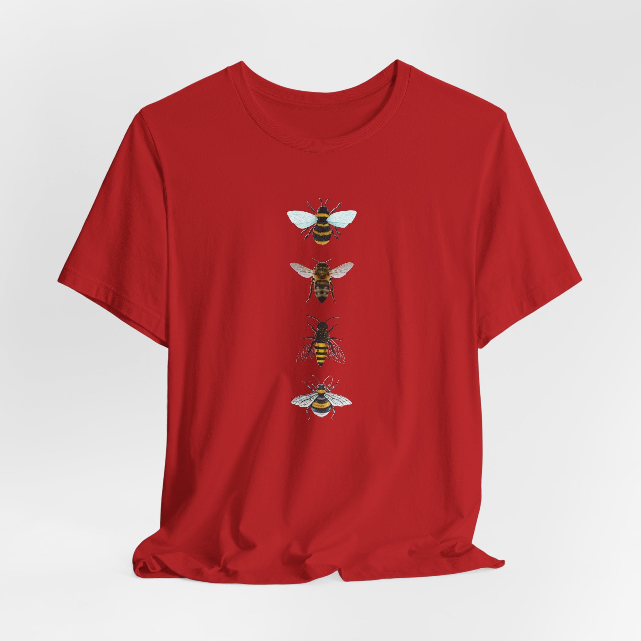 Red t-shirt with bee illustrations on a white background