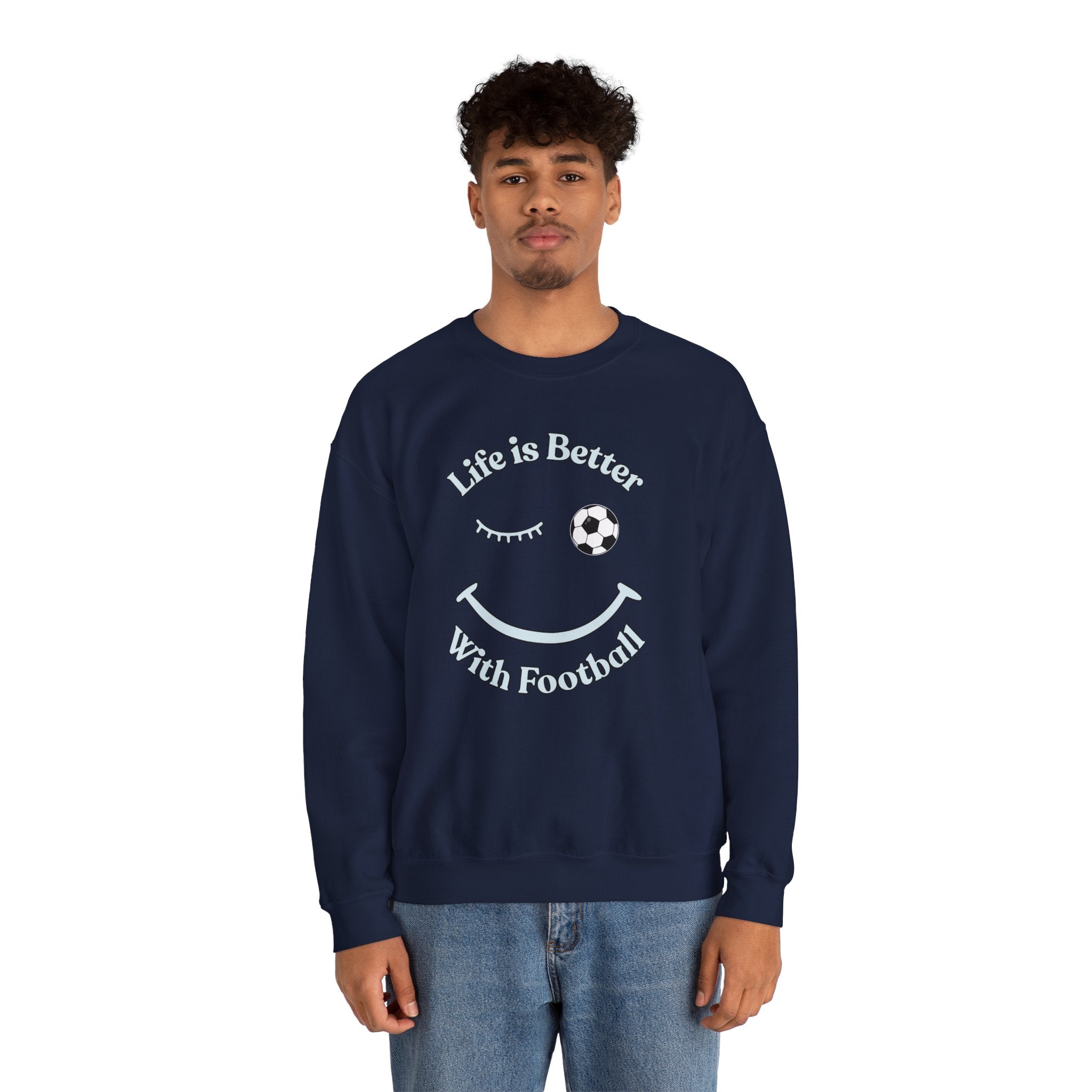 Man wearing a navy blue sweatshirt with 'Life is Better With Football' text and smiley face design on a white background