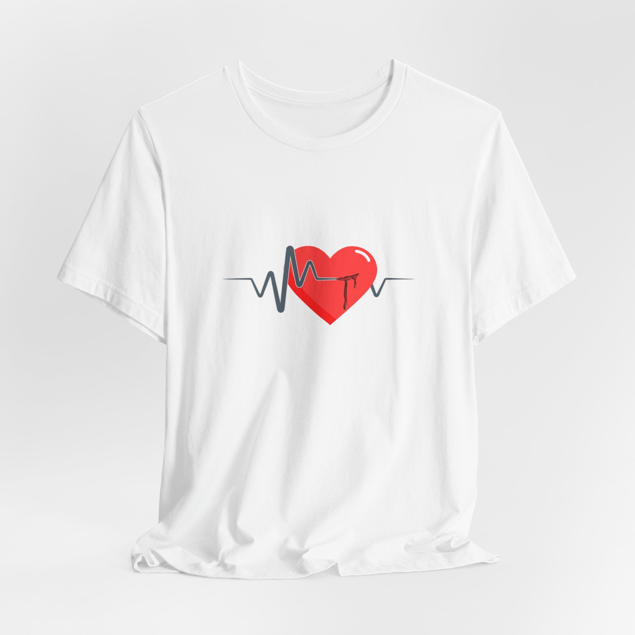 White t-shirt with a red heart and black line design on a white background