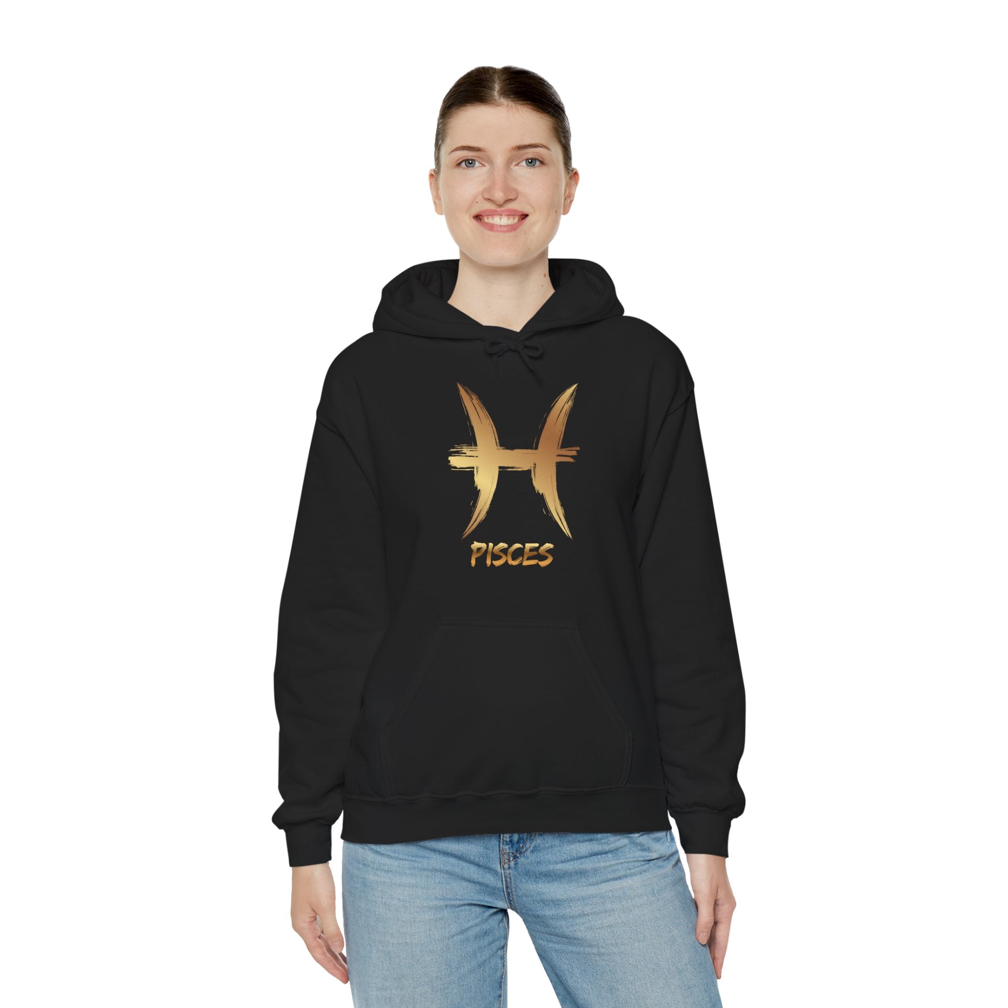 Person wearing black hoodie with gold Pisces symbol and text on a white background