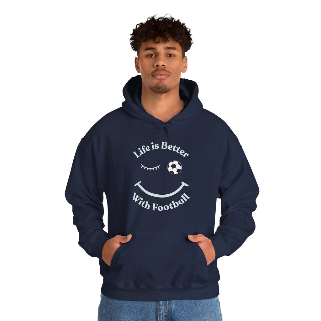Person wearing a navy hoodie with 'Life is Better With Football' text and smiley face design on a white background