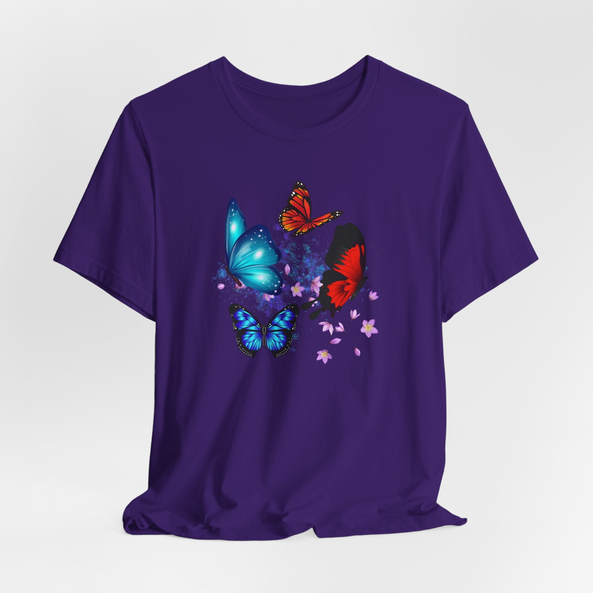 Purple t-shirt with colorful butterfly design on a white background