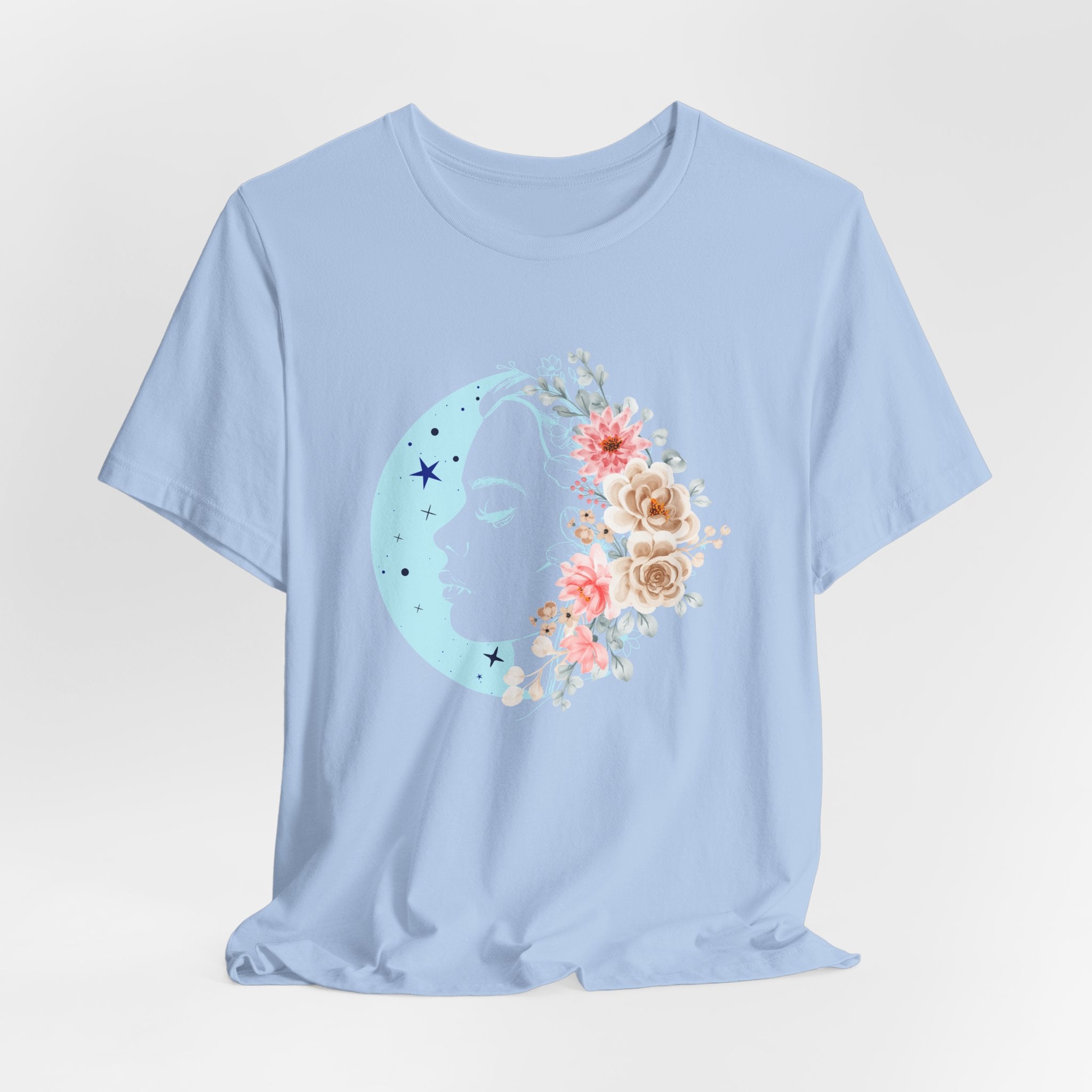 Light blue t-shirt with floral and moon design on a white background
