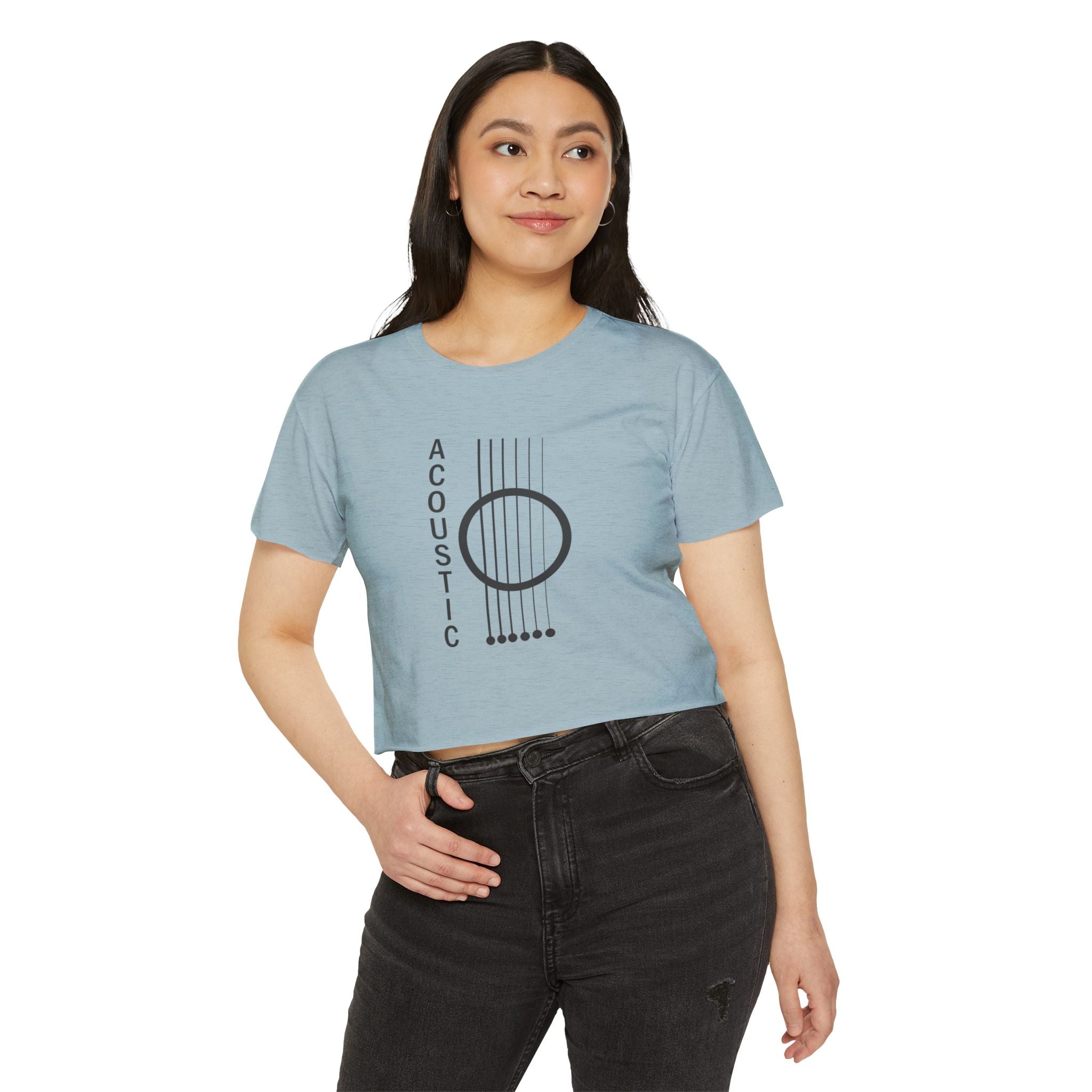Woman wearing a light blue t-shirt with an acoustic guitar graphic and 'Acoustic' text on a white background