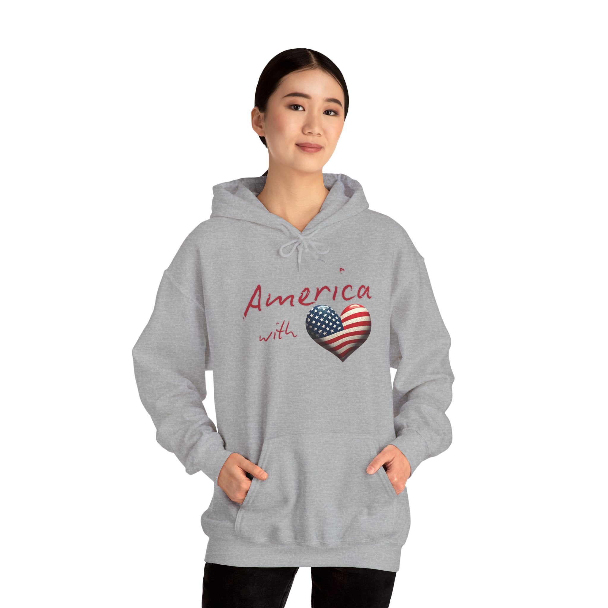 Person wearing a gray hoodie with 'America with heart' design on a white background