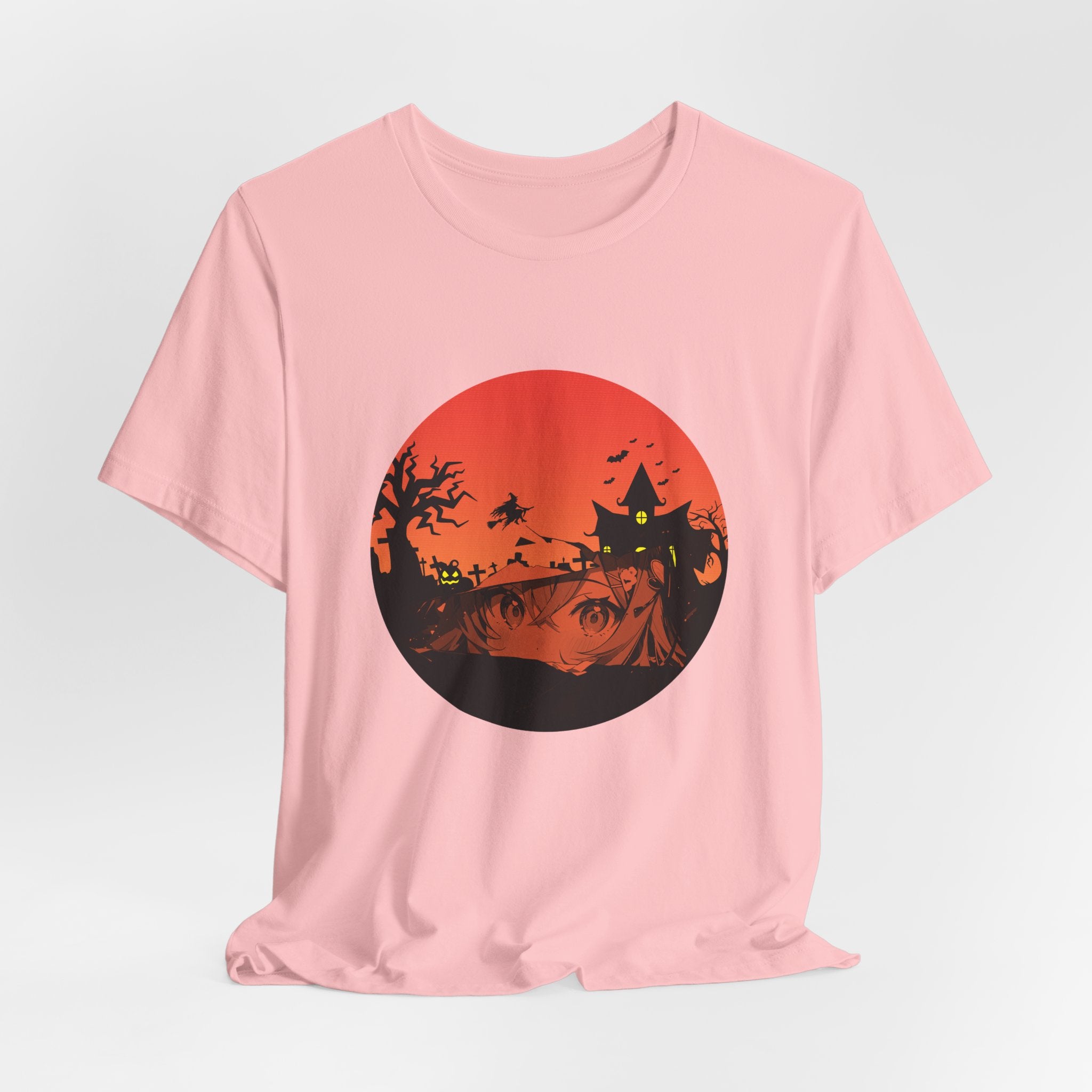 Pink t-shirt with a Halloween-themed graphic on a light gray background