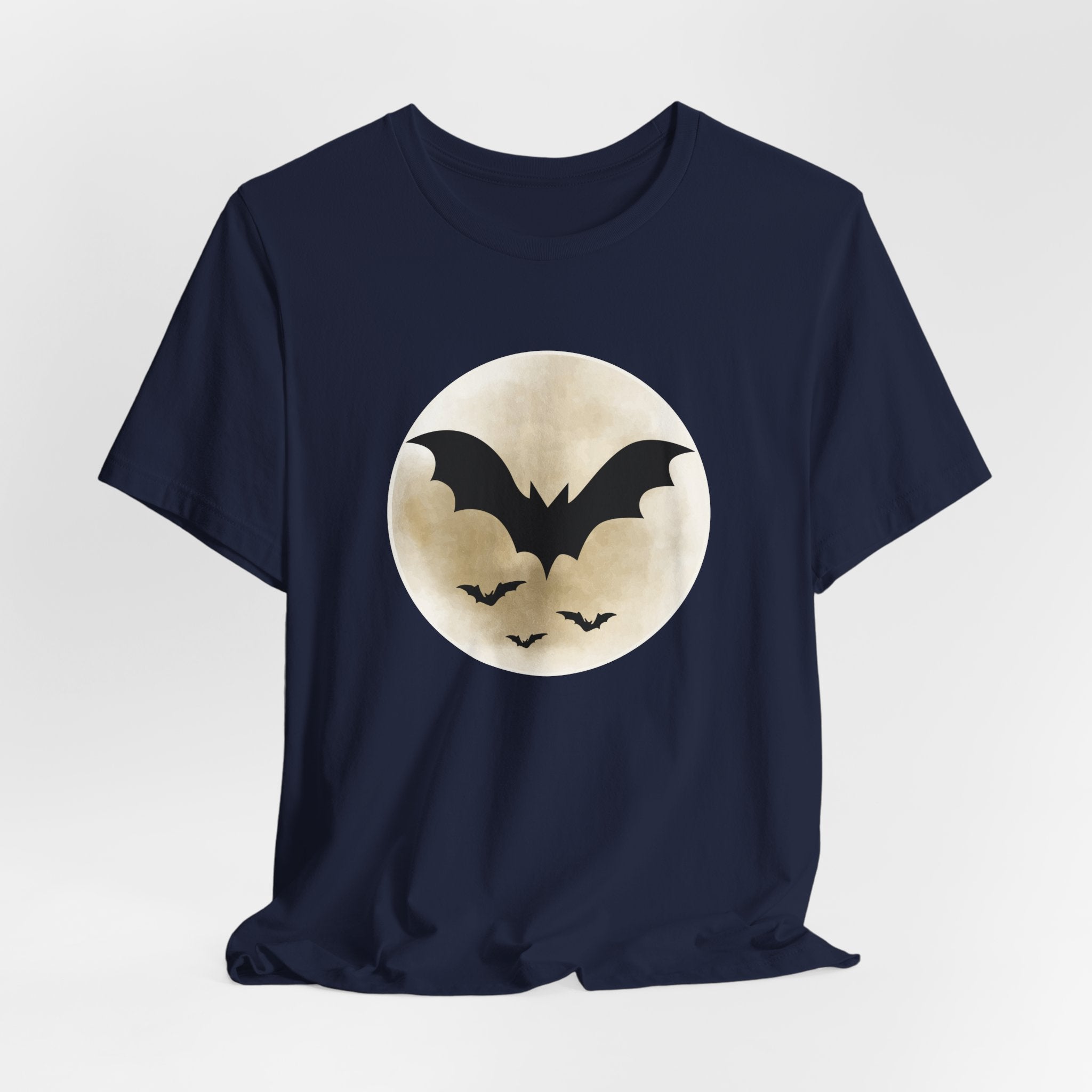 Navy blue t-shirt with full moon and bats design on a light gray background