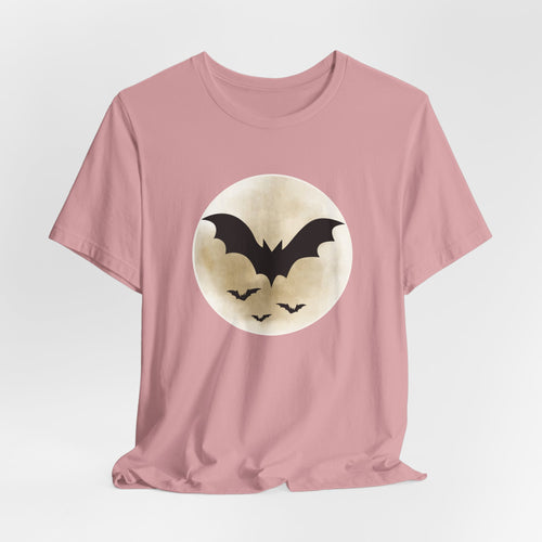 Orchid pink t-shirt with full moon and bats design on a light gray background