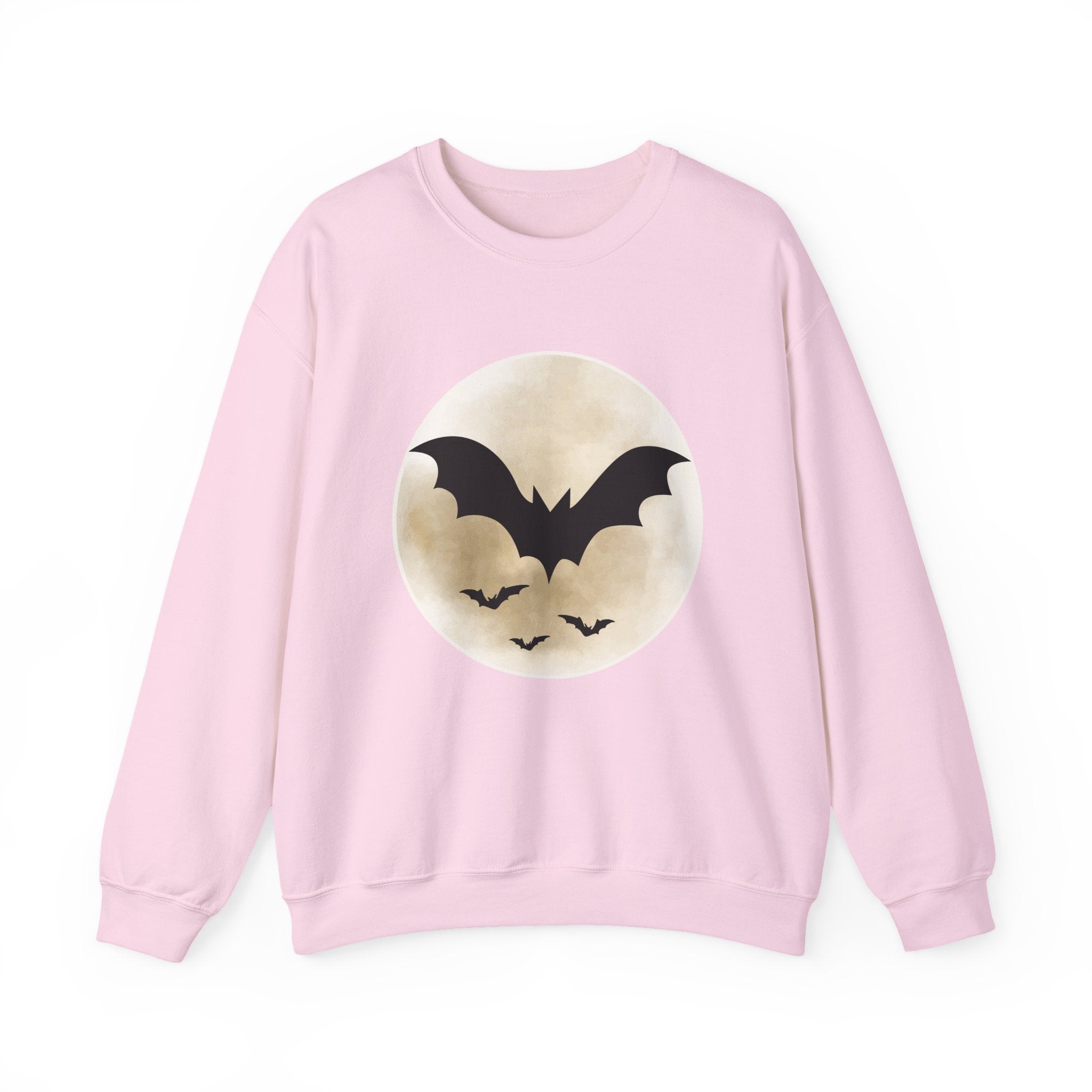Pink sweatshirt with a bat and moon design on a white background