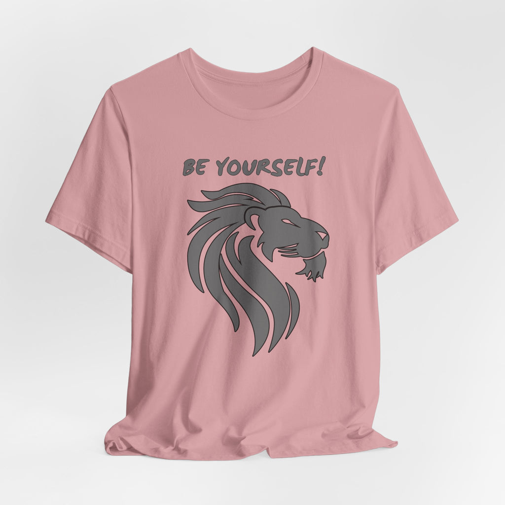 Orchid pink t-shirt with a lion graphic and 'BE YOURSELF!' text on a light gray background