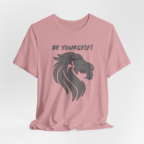 Orchid pink t-shirt with a lion graphic and 'BE YOURSELF!' text on a light gray background