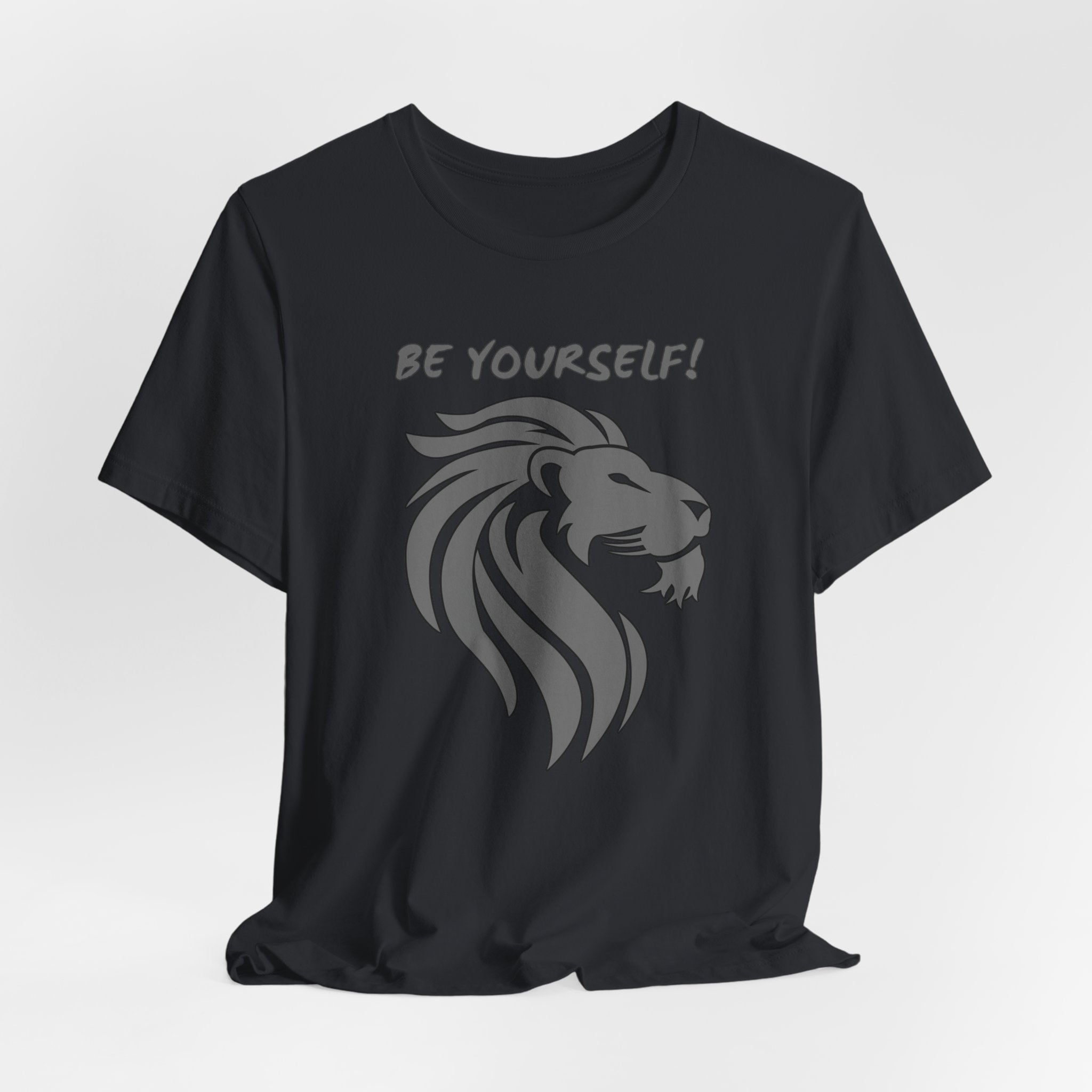Vintage black t-shirt with a lion graphic and 'BE YOURSELF!' text on a white background